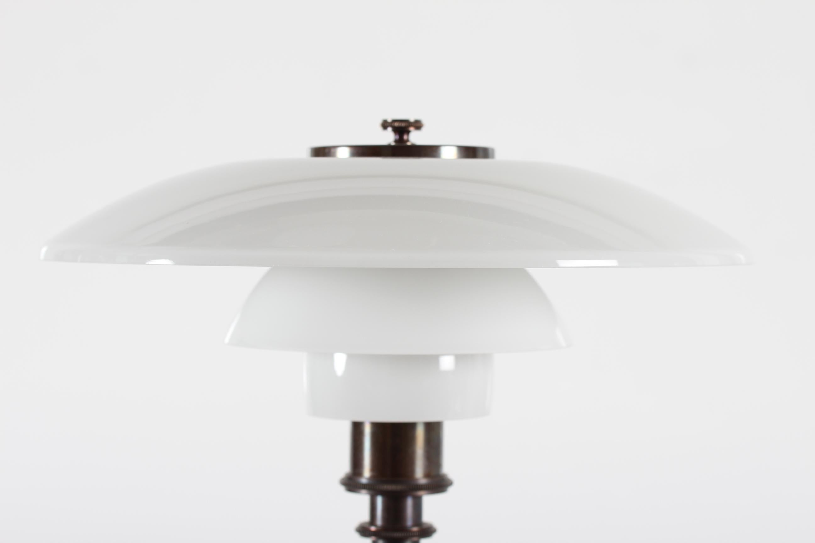 Vintage Poul Henningsen table lamp model trePH PH 3/2 special anniversary edition from 1994.
The lamp was designed by the Danish designer Poul Henningsen
It was made in 1994 as a special edition on the occasion of his 100 birthday. 
PH was born