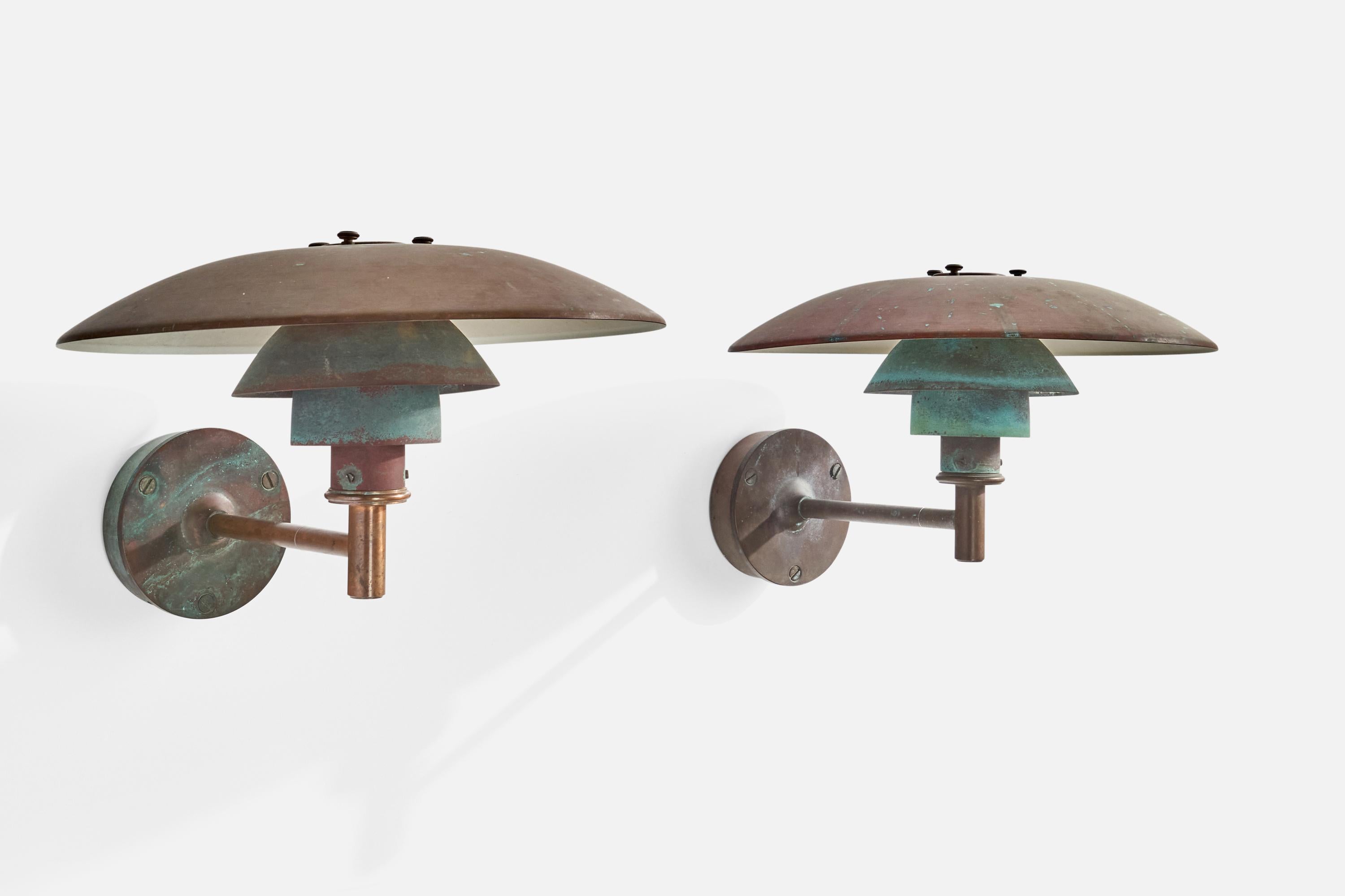 A pair of patinated copper wall lights designed by Poul Henningsen and produced by Louis Poulsen, Denmark, c. 1950s.

Overall Dimensions (inches): 10.5” H x 18” W x 20”  D
Back Plate Dimensions (inches): 5.75” H x 5.75” W x 1.75”  D
Bulb