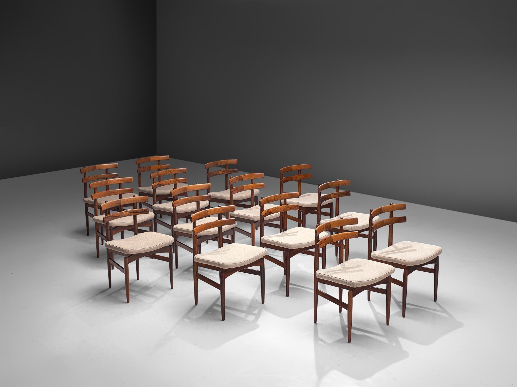 Poul Hundevad, large set of fourteen chairs model 30, rosewood and fabric, Denmark, 1960s.

Set of fourteen rare dining room chairs in rosewood and light fabric designed by Poul Hundevad. These chairs have a beautiful design, characteristic as