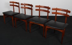 Poul Hundevad set of four dining chairs in teak and leather, Denmark 1960s
