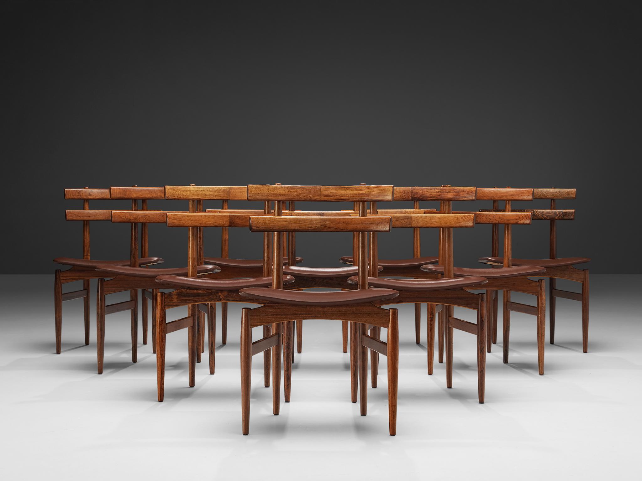 Poul Hundevad for Poul Hundevad, set of ten dining chairs model 30, rosewood, leather upholstery, Denmark, 1958
 
Designed and manufactured by Poul Hundevad the dining chairs model 30 are a great example of Scandinavian Modern design. Executed in