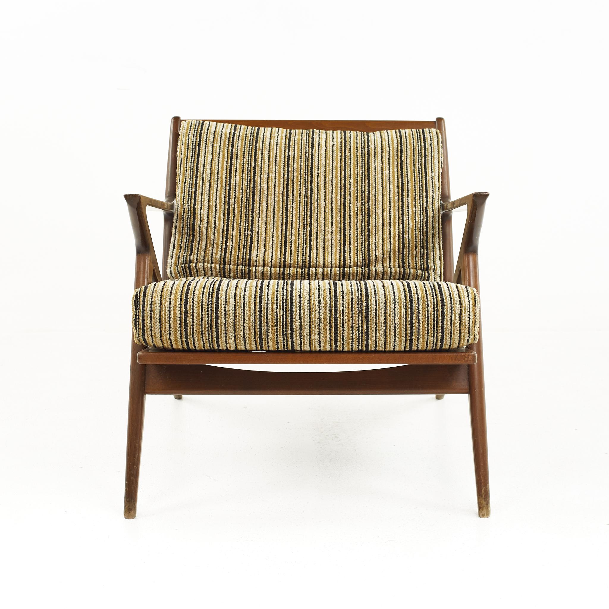 Poul Jensen for Selig Mid Century Z Lounge Chair

The chair measures: 29.5 wide x 31.5 deep x 26.5 high, with a seat height of 16 inches and arm height/chair clearance of 22.25 inches

All pieces of furniture can be had in what we call restored