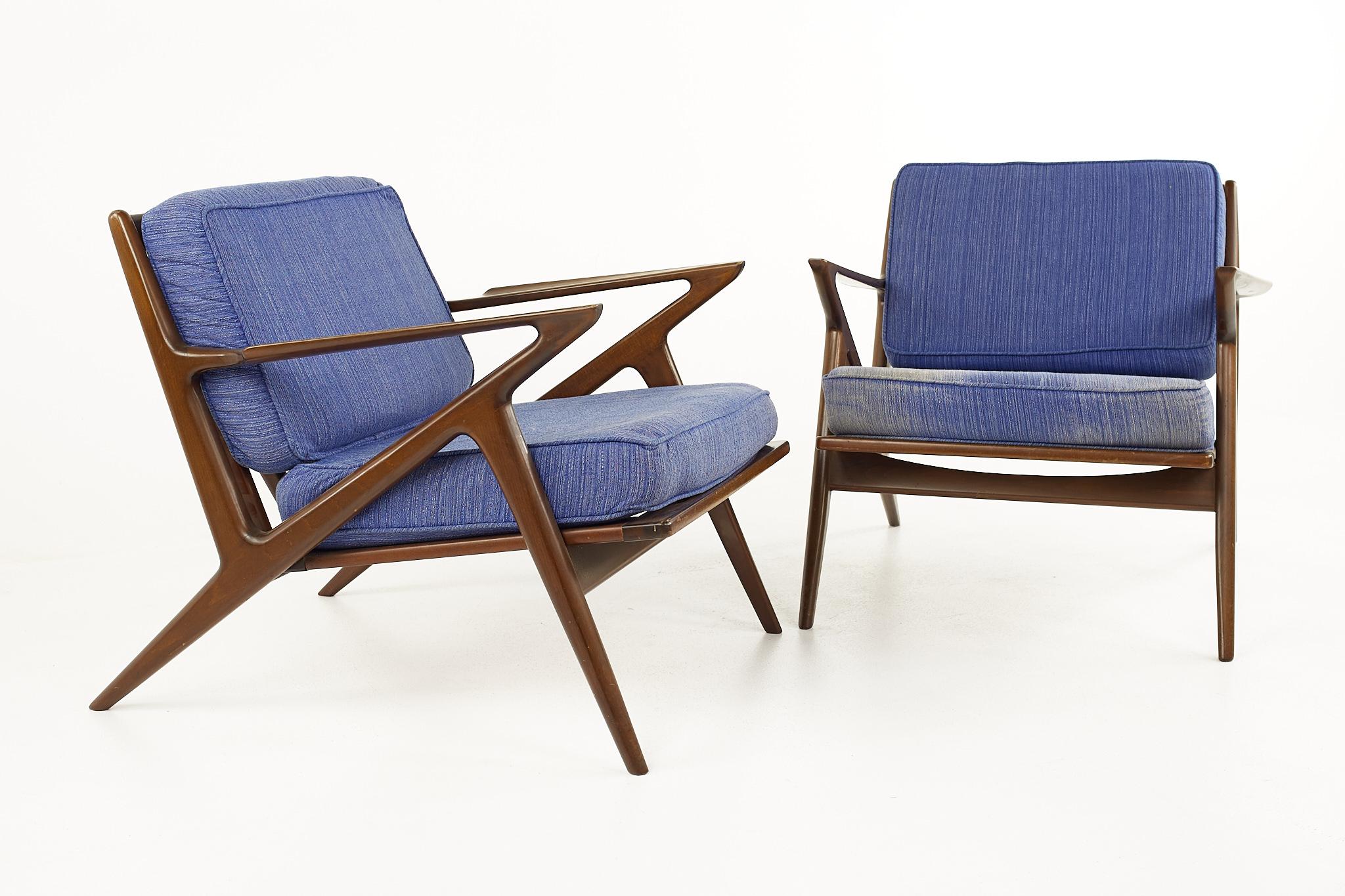 Poul Jensen Mid Century Z lounge chairs - Pair 

Each chair measures: 29.5 wide x 29.75 deep x 26.5 inches high, with a seat height of 15.75 and arm height of 22.25 inches

All pieces of furniture can be had in what we call restored vintage