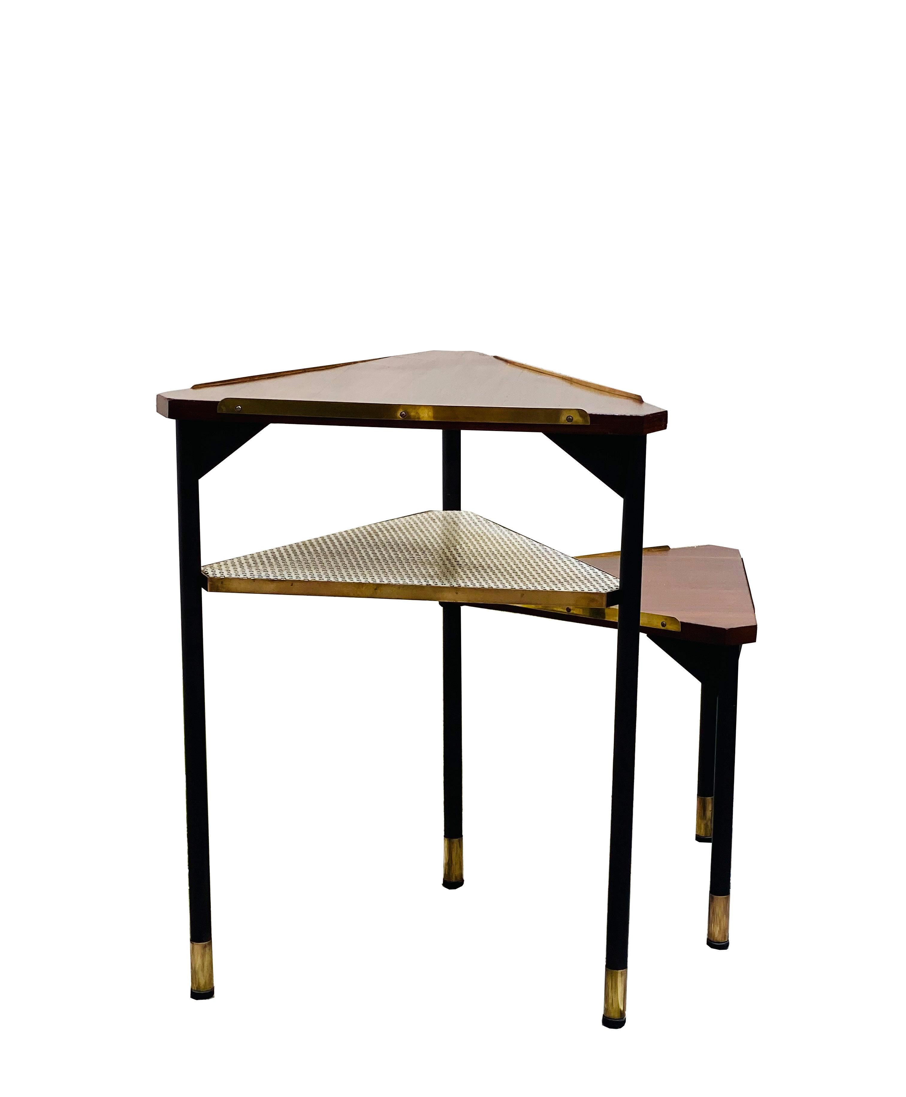 Peculiar group of 3 triangular-shaped swivel coffee tables 1960s made of oak wood and black lacquered iron and brass feet.