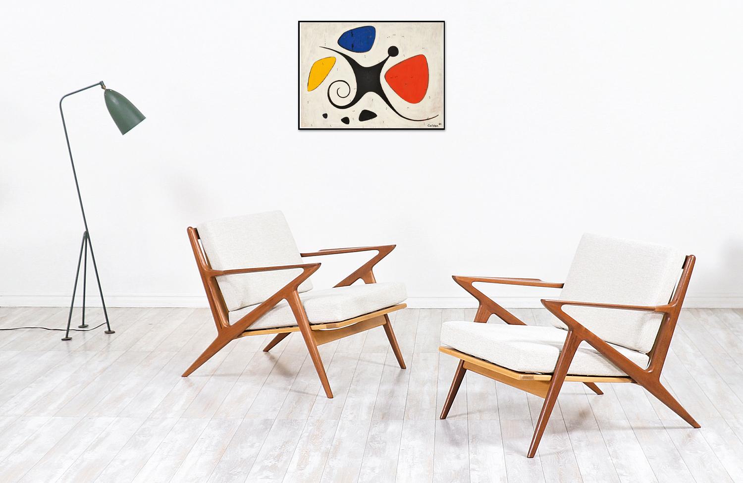 A must-have pair of iconic modern lounge chairs! Designed by the famous architect Poul Jensen and produced by the renowned company Selig in Denmark circa 1960s. This spectacular design is known as the 