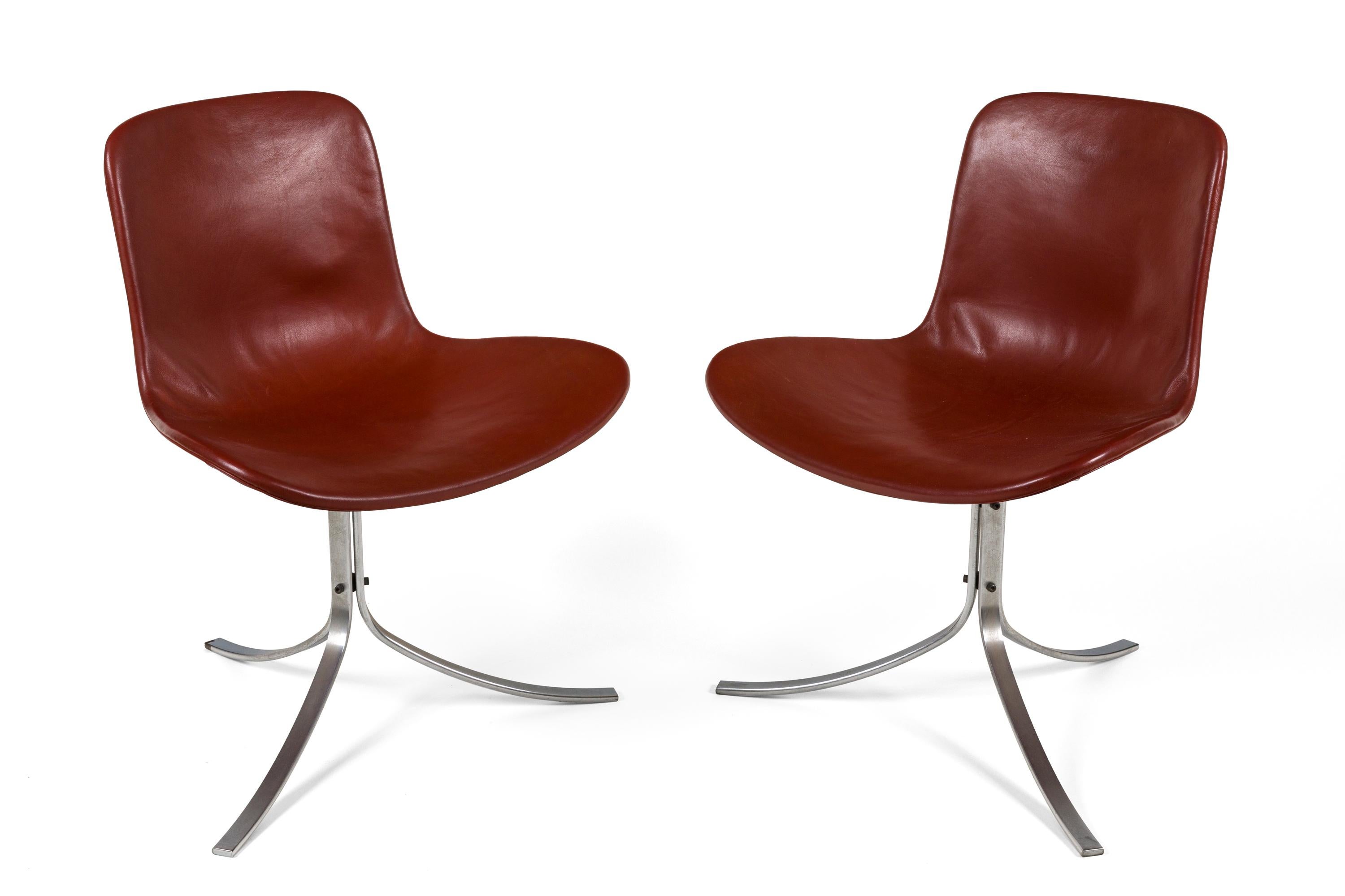 A pair of PK 9 chairs in very good condition, upholstered in brown leather with chromed steel frames. Marked with E. Kold Christensen's logo.