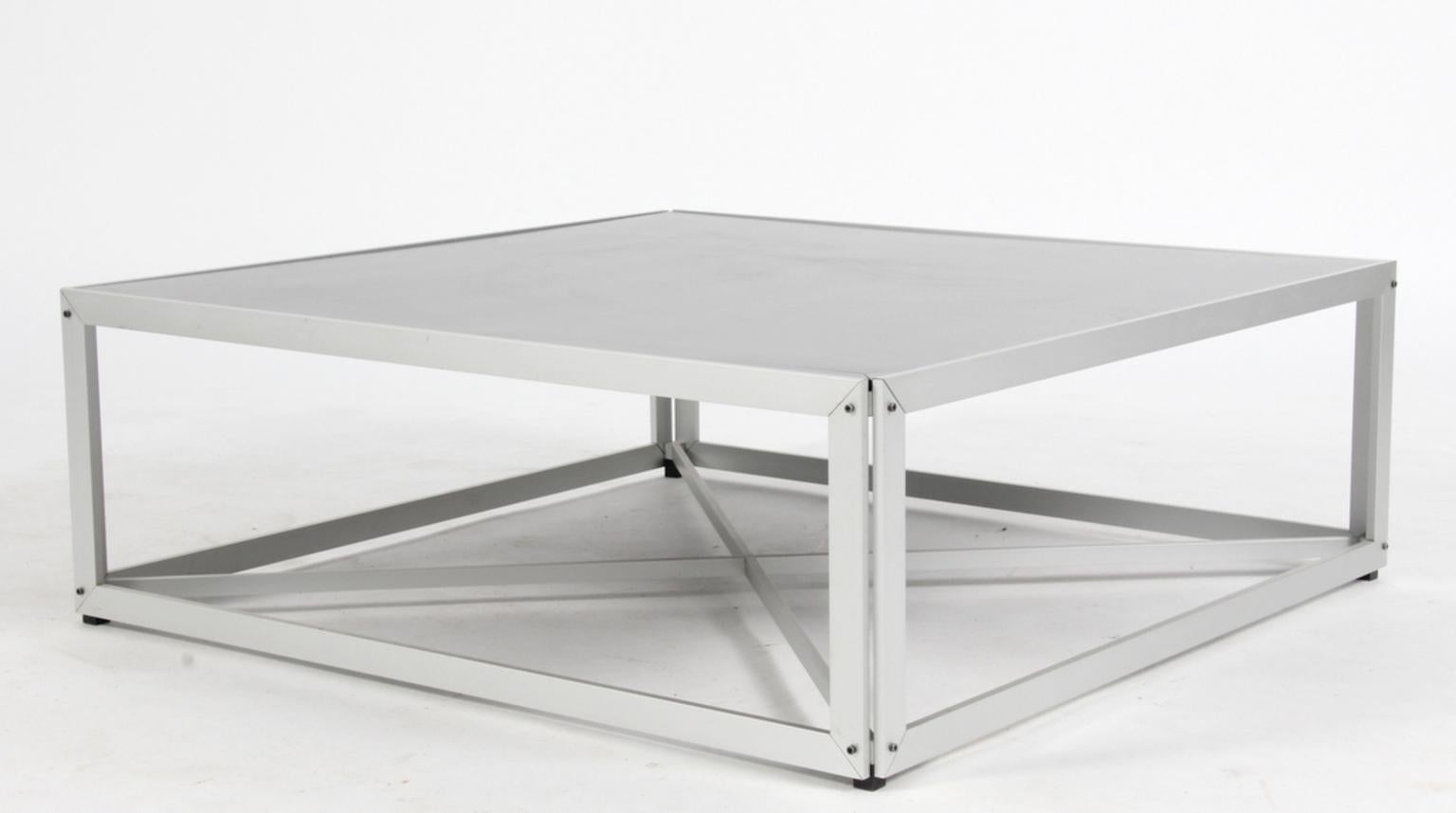 Poul Kjærholm coffee table in aluminium and black painted mdf.

Manufactured by PP møbler.

Exhibition System. 

Designed in 1979.

Later put in production for 
