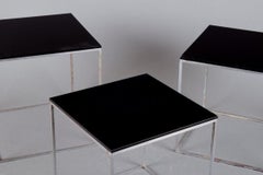Poul Kjærholm, Danish furniture designer. Set of nesting tables PK 71.
