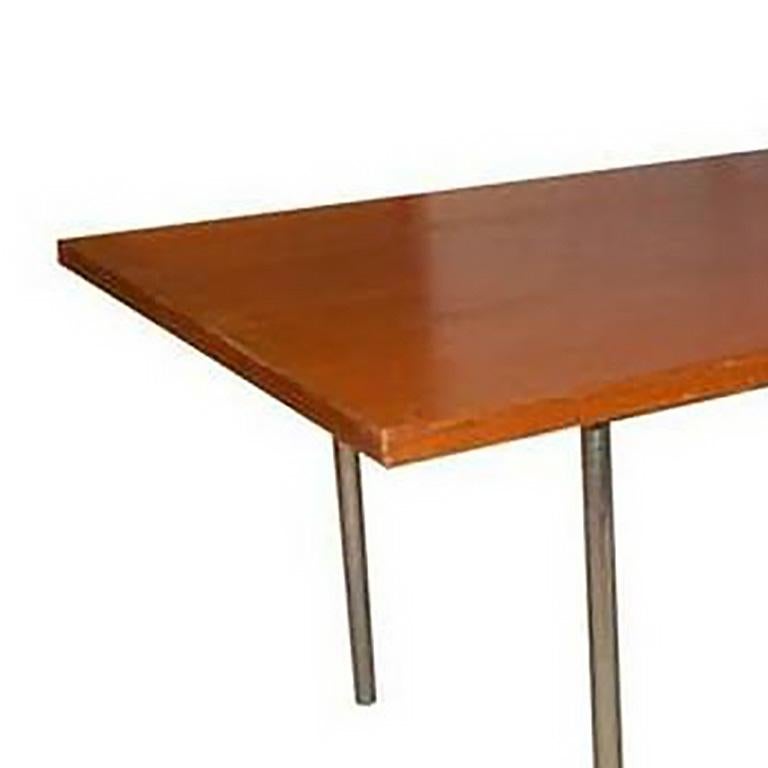 Oak table with matte chrome plated steel legs by Poul Kjaerholm, Denmark 1964 E Kold Christensen. Impressed manufacturer's mark on each leg.