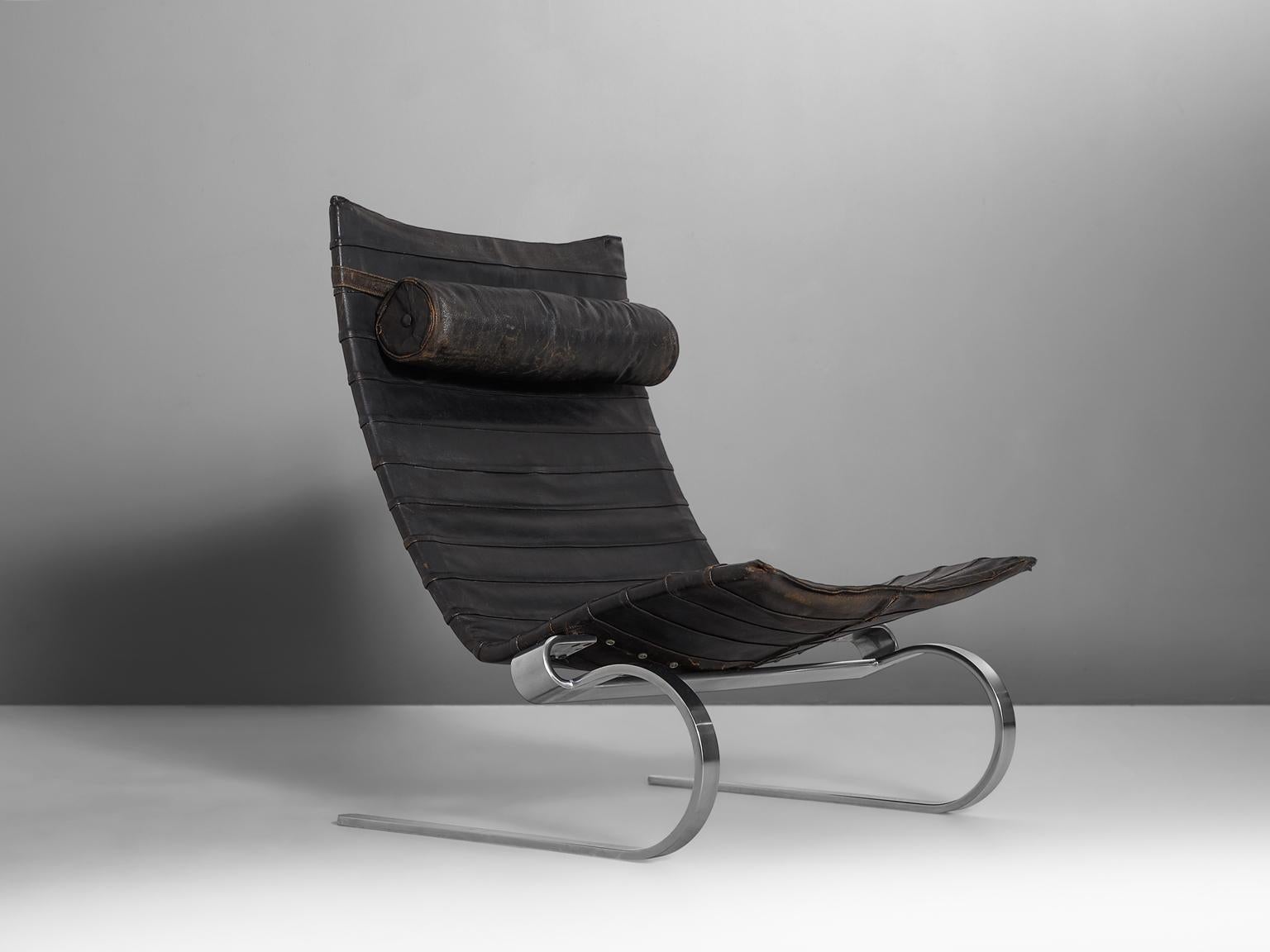 Poul Kjærholm for E. Kold Christensen, Lounge chair PK20, in stainless steel and leather, Denmark, 1967.

Cantilevered easy chair designed by Poul Kjærholm for E. Kold Christensen. This eye-catching chair is made of matte, chrome-plated spring steel