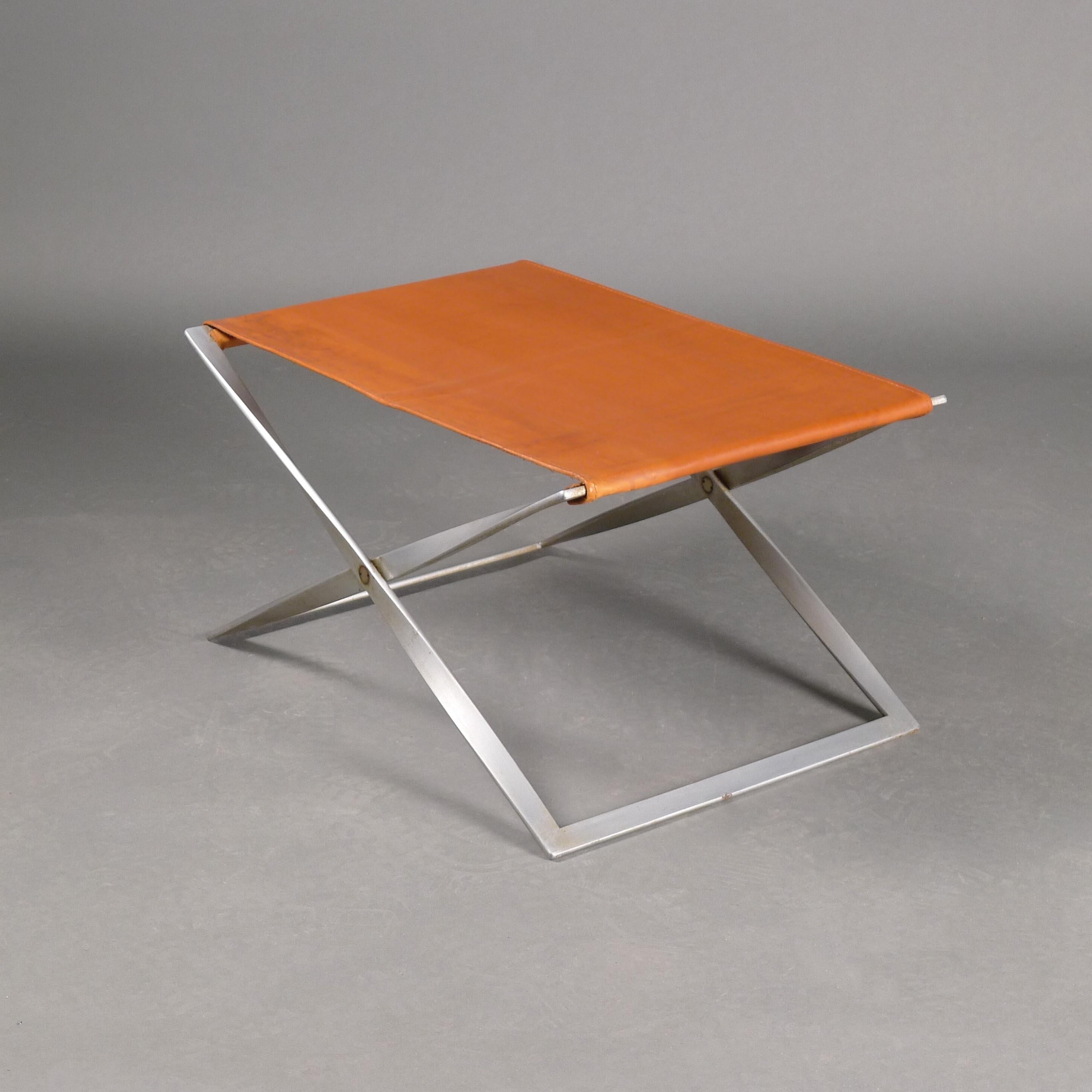Poul Kjaerholm for E Kold Christensen, Denmark, 1960s

A PK-91 folding stool in chromed steel with vintage tan leather. Stool is stamped and displays the early stepped knuckle joints at the corners of the metal. The propeller joints contain