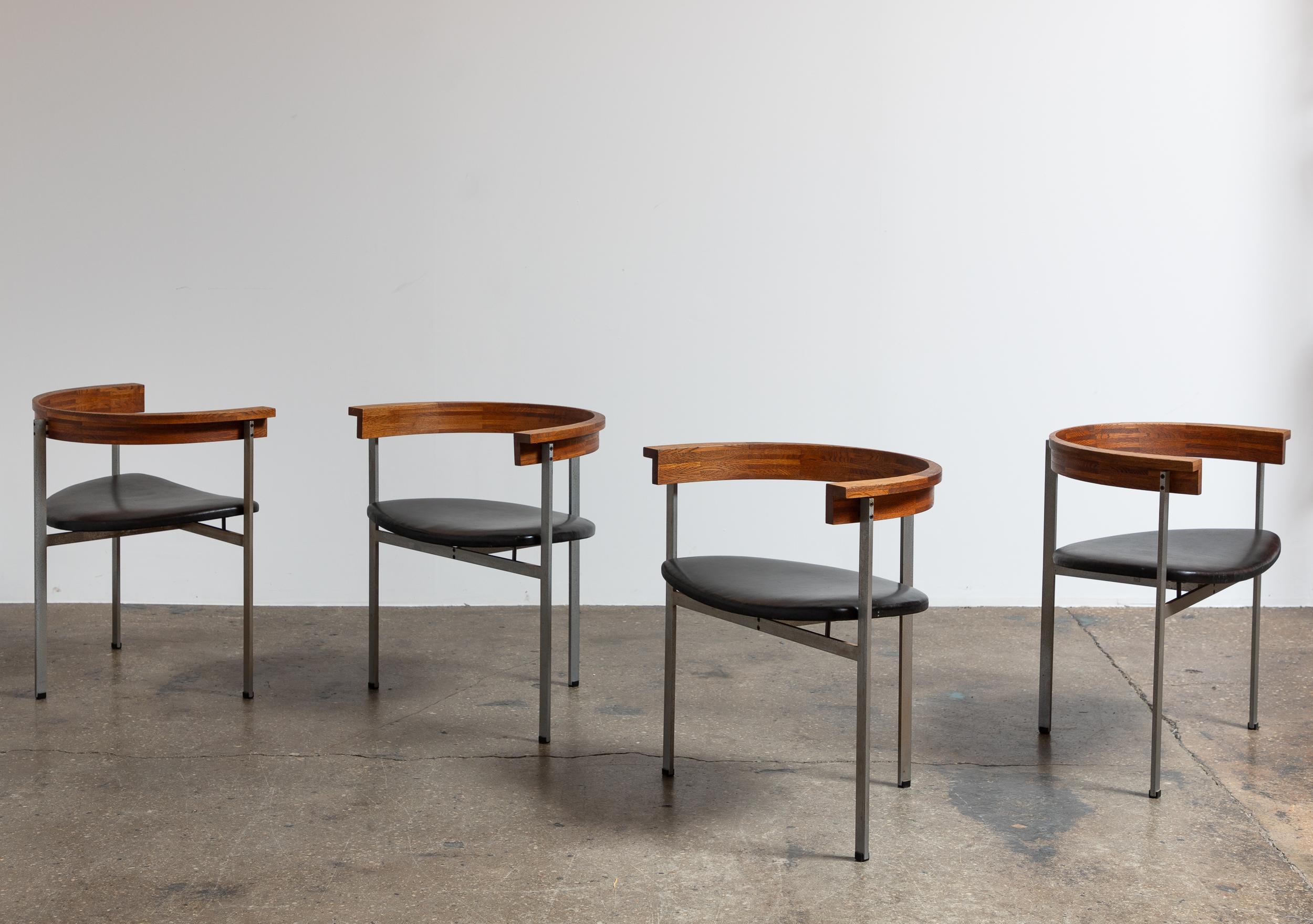 A set of four Poul Kjærholm PK 11 armchairs in black original leather, designed by Poul Kjærholm for E. Kold Christensen. First introduced in 1957, these iconic chairs showcase Kjærholm’s minimalist style, skillfully blending industrial elements
