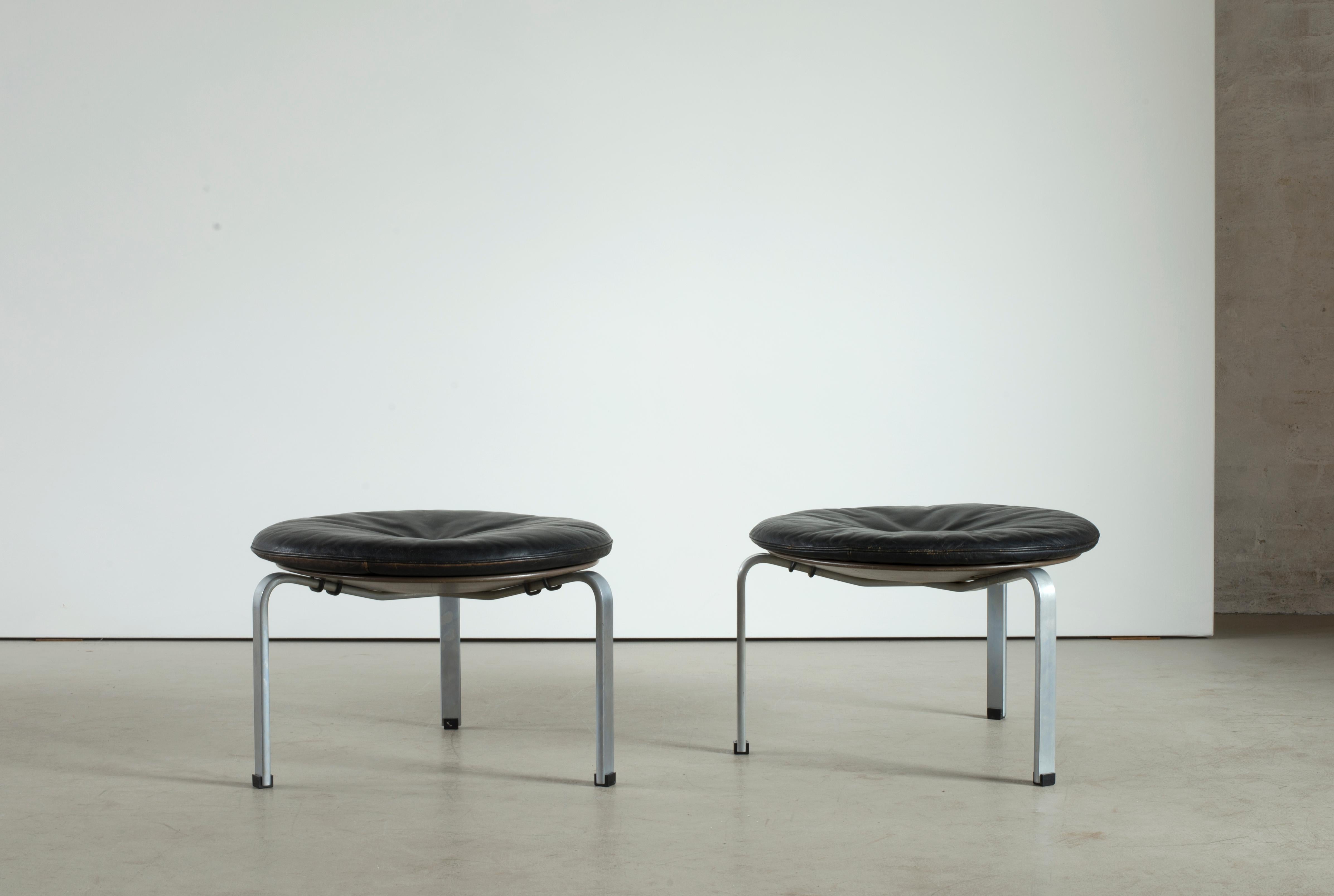 Poul Kjaerholm pair of PK33 stools, dull chromium-plated steel and oxide. Executed by E. Kold Christensen, Denmark.