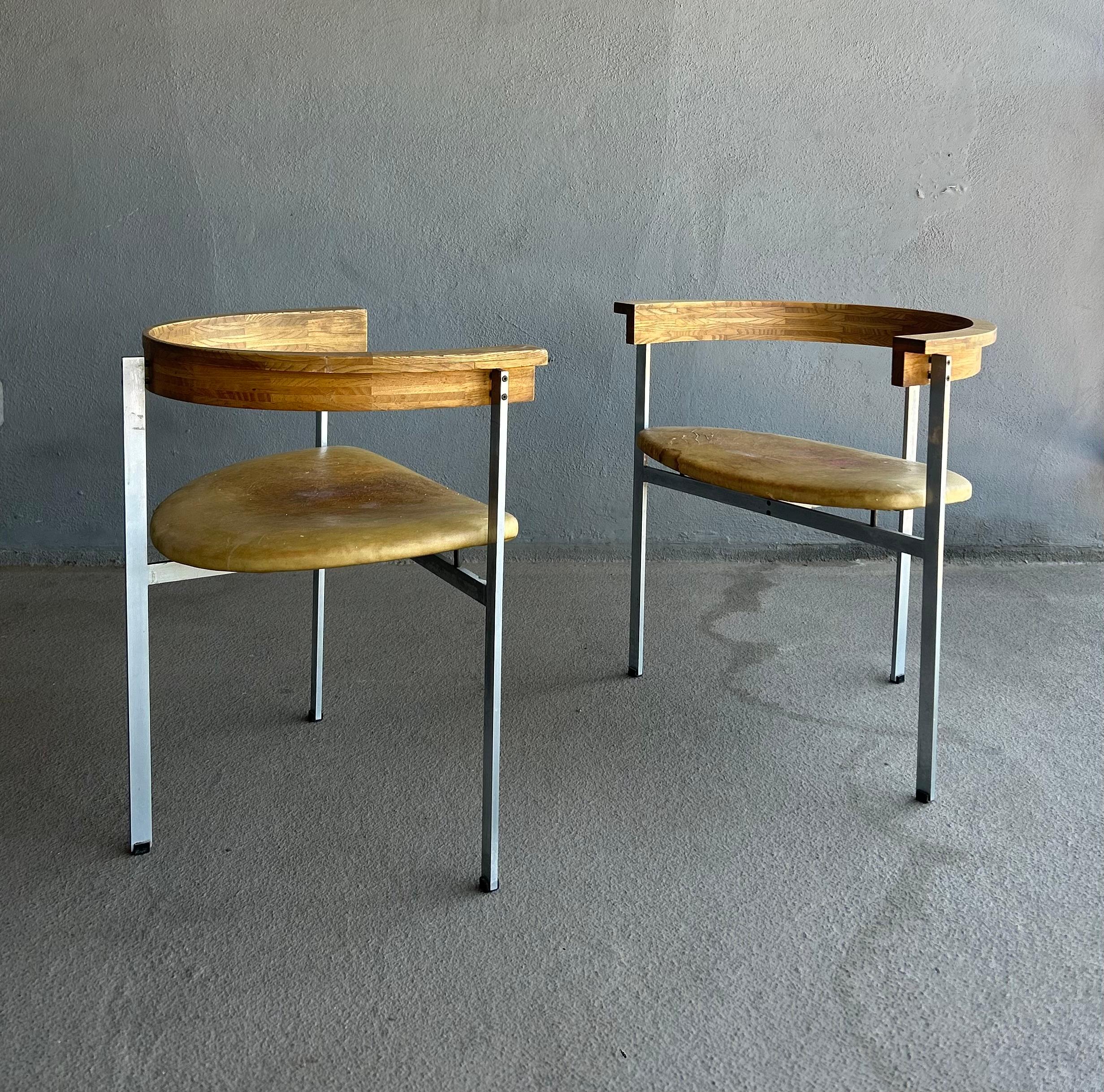 Pair of all original PK 11 chairs by Poul Kjærholm for E. Kold Christensen. These chairs retain their Georg Jensen labels as well. 

