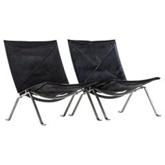 Poul Kjærholm PK-22 easy chairs by E. Kold Christensen in Denmark