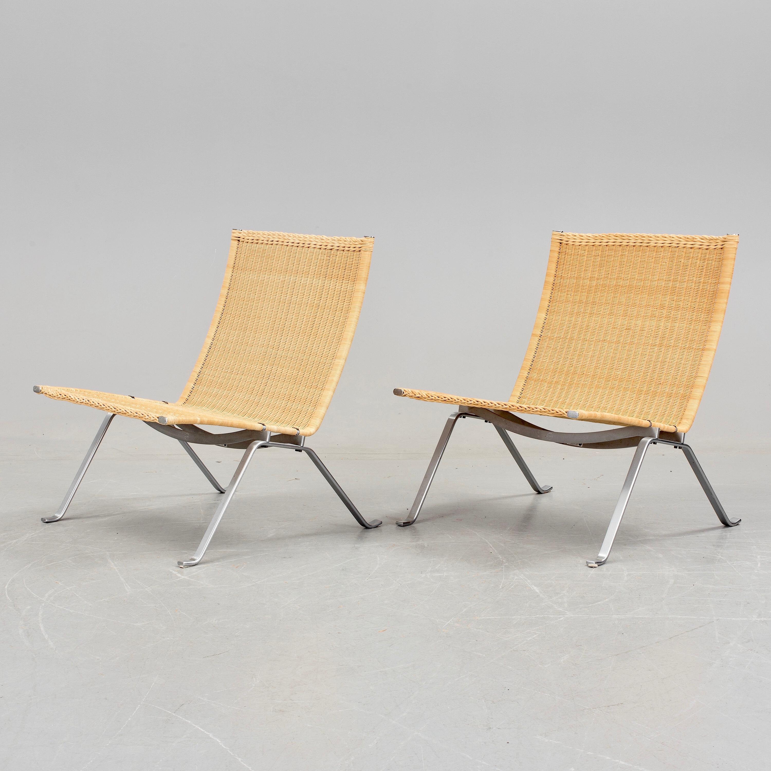 Pair of cane easy chairs model PK-22 designed by Poul Kjærholm for E. Kold Christensen and produced by Fritz Hansen in Denmark.