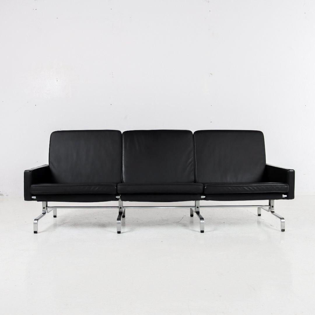This three-seater sofa is a rare, timeless, and original old 1960s version of the PK-31, a famous and iconic design by Poul Kjaerholm for Kold Christensen. The previous owner had the sofa reupholstered with beautiful high-quality leather. The metal