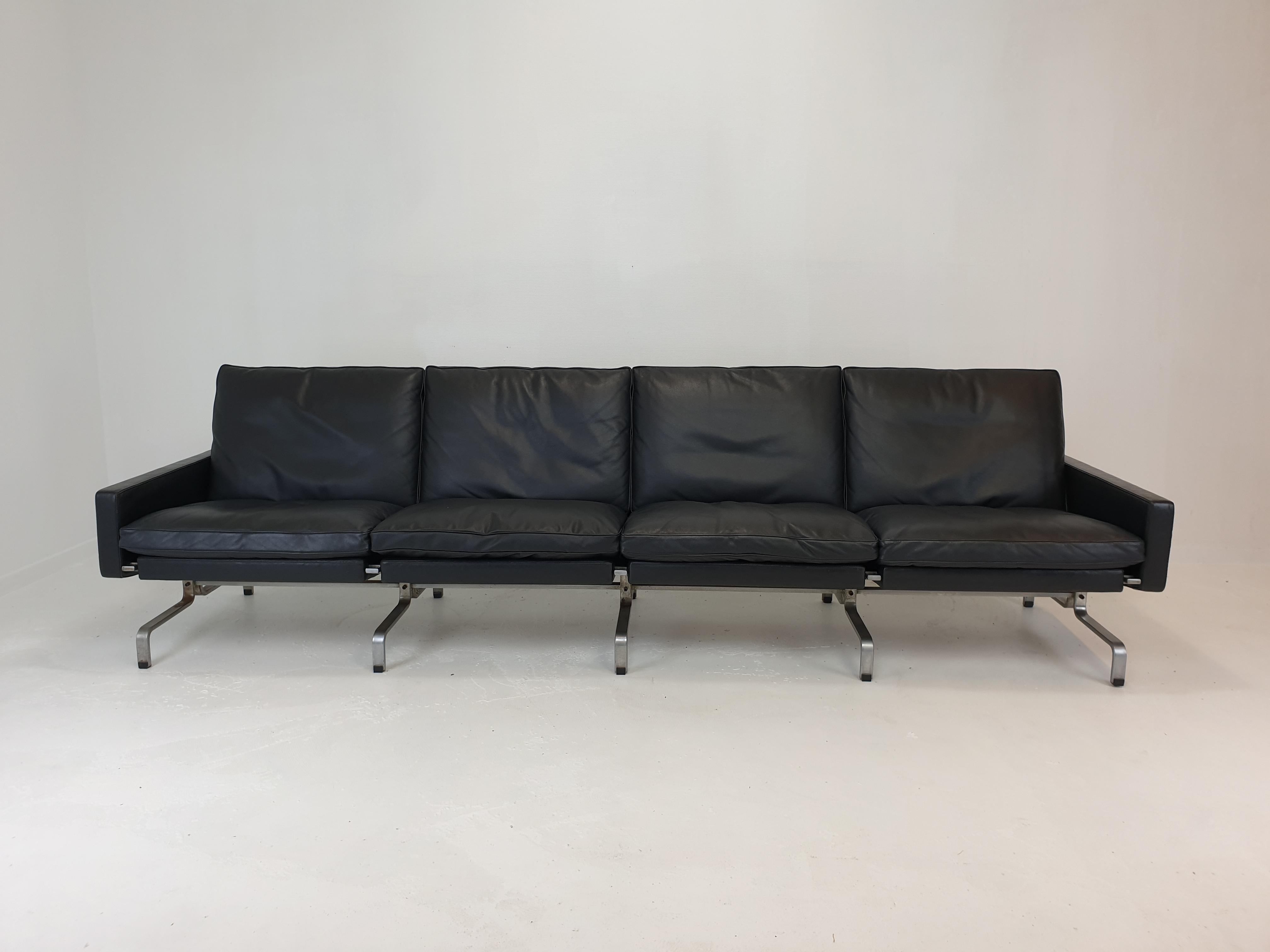Very rare and exceptional 4 seat PK31 sofa.
This stunning sofa is designed by Poul Kjærholm for E. Kold Christensen, Denmark 1950's.

Beautiful and high quality original black leather with great patina on the sofa. 
Renewed soft and comfortable