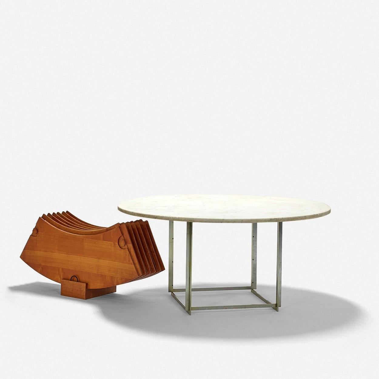 Poul Kjaerholm
PK 54 dining table with extension leaves
E. Kold Christensen
Denmark, 1960s
flint-rolled marble, chrome-plated steel
Measures: 55 D × 24.5 H inches (83-inch diameter with leaves).