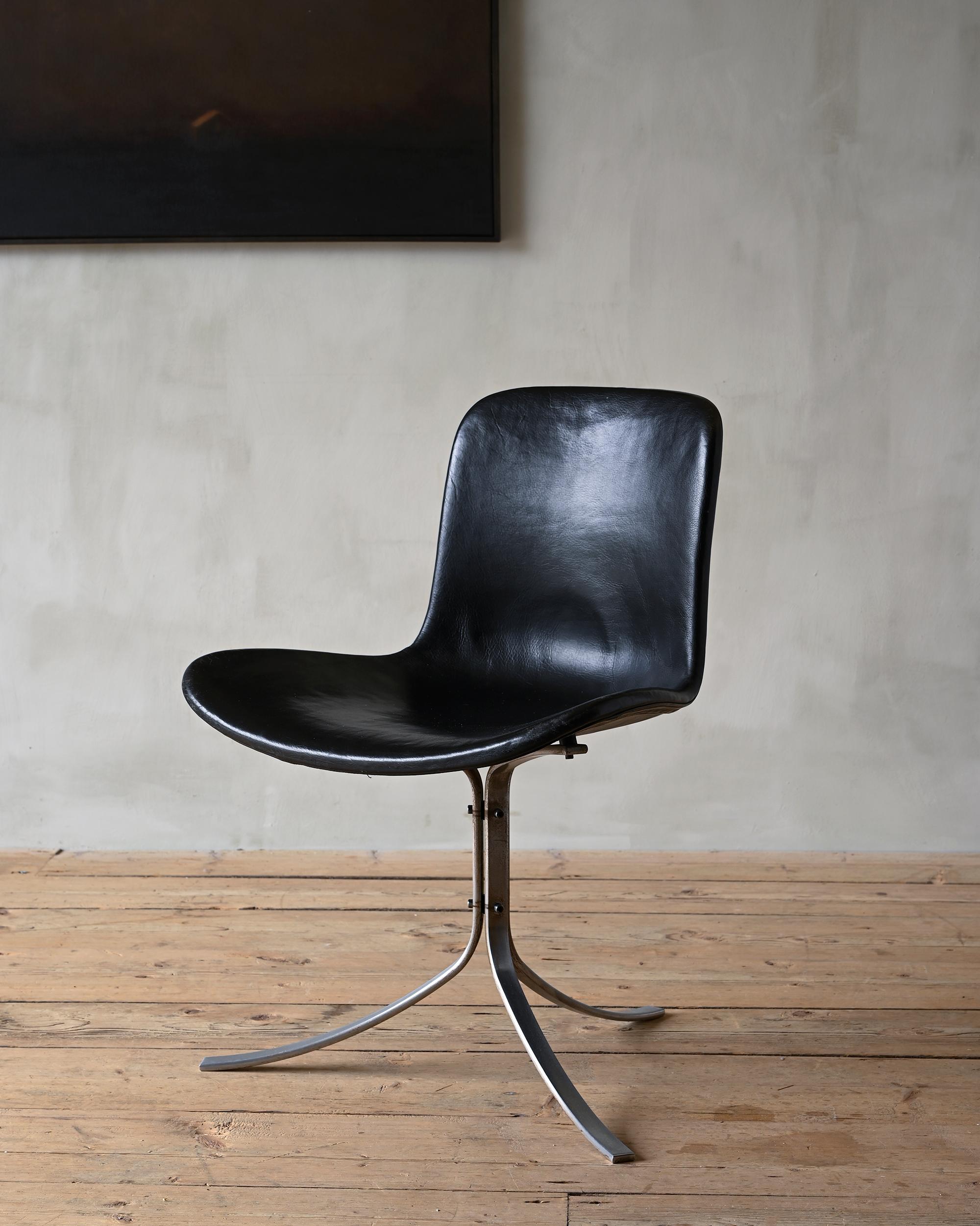 PK 9 dining chair by Poul Kjærholm in patinated, black leather with steel frame. circa 1960s Denmark.