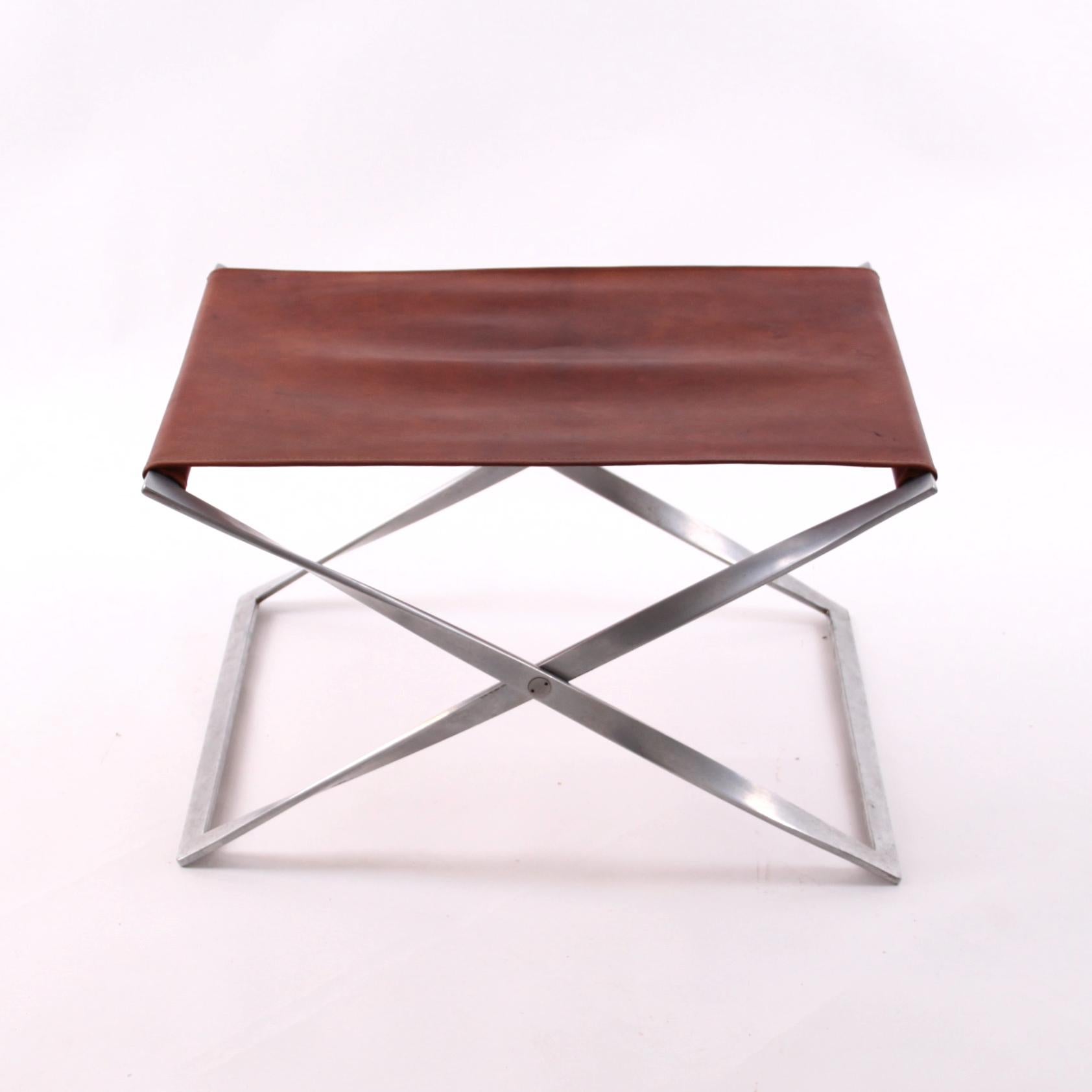 Poul Kjærholm & E. Kold Christensen - Scandinavian Modern 

The classic PK 91 folding stool by Poul Kjærholm. Designed 1961 and manufactured by E. Kold Christensen A/S, Copenhagen, Denmark, this stool is from the earliest production.