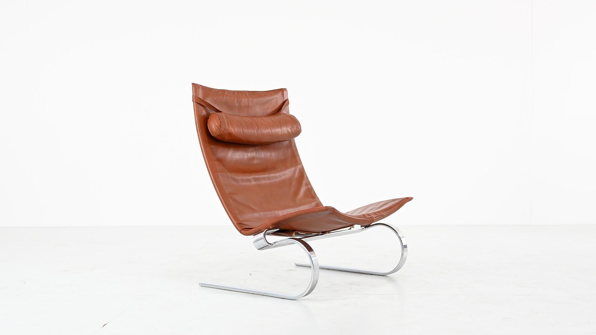 First edition of the PK20 lounge chair, a graceful, elegant masterpiece created in 1968 by Danish designer Poul Kjaerholm for Ejvind Kold Christensen. 

It consists of an aesthetic cantilever structure in mat chromed steel with leather seat and