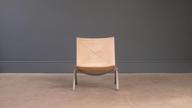 Original classic PK22 lounge chair designed by Poul Henningsen for E Kold Christensen, 1957, Denmark. Wonderful and super rare example in original light tan leather with beautiful patina. Fully stamped with the EKC logo. Great piece.