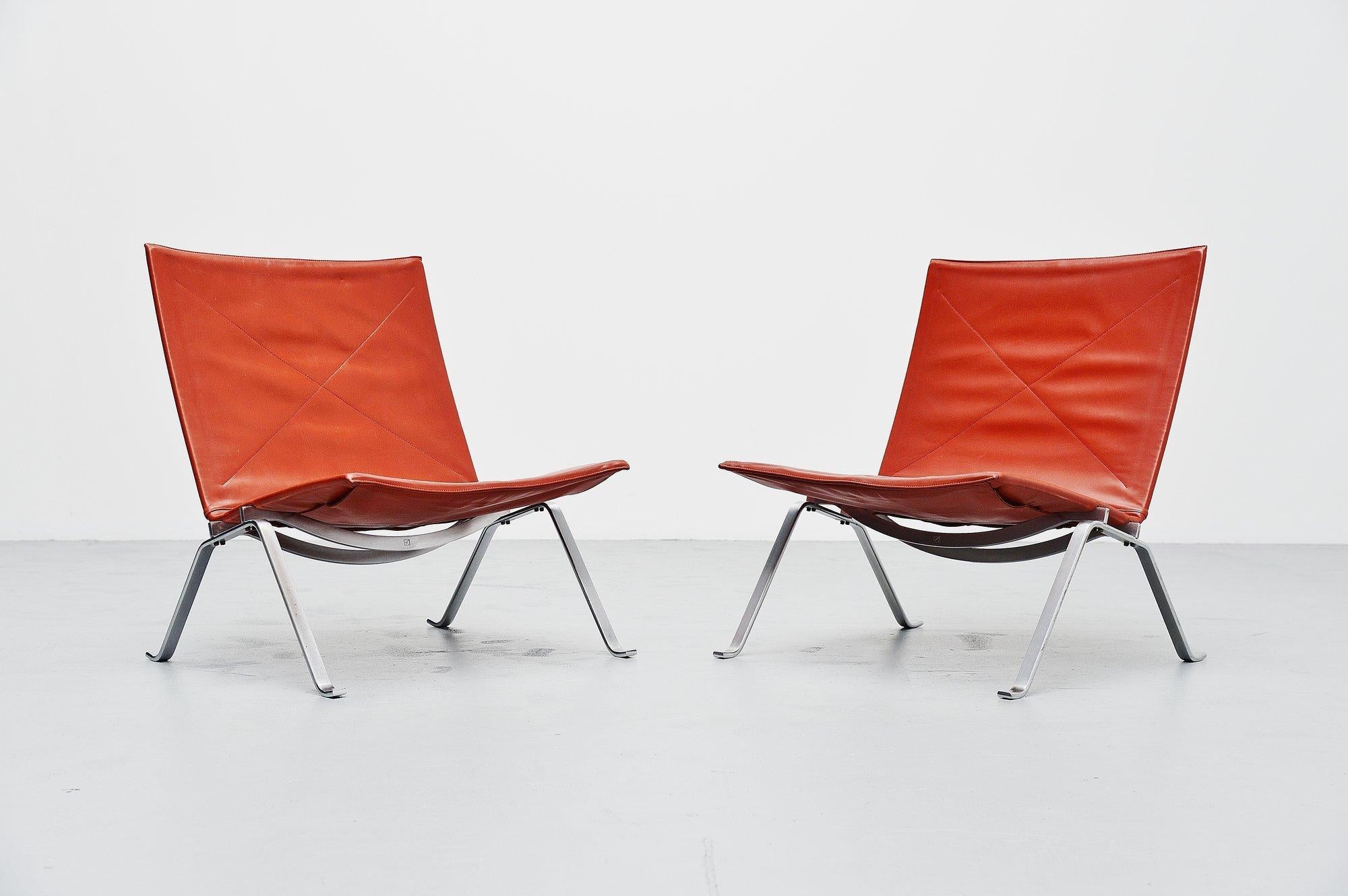 This is for the famous pair of PK22 chairs designed by Poul Kjaerholm for E Kold Christensen, Denmark, 1956. These chairs are early editions with very nice and rare oxblood leather. The chairs consisted of a spring steel structure, one pair each of