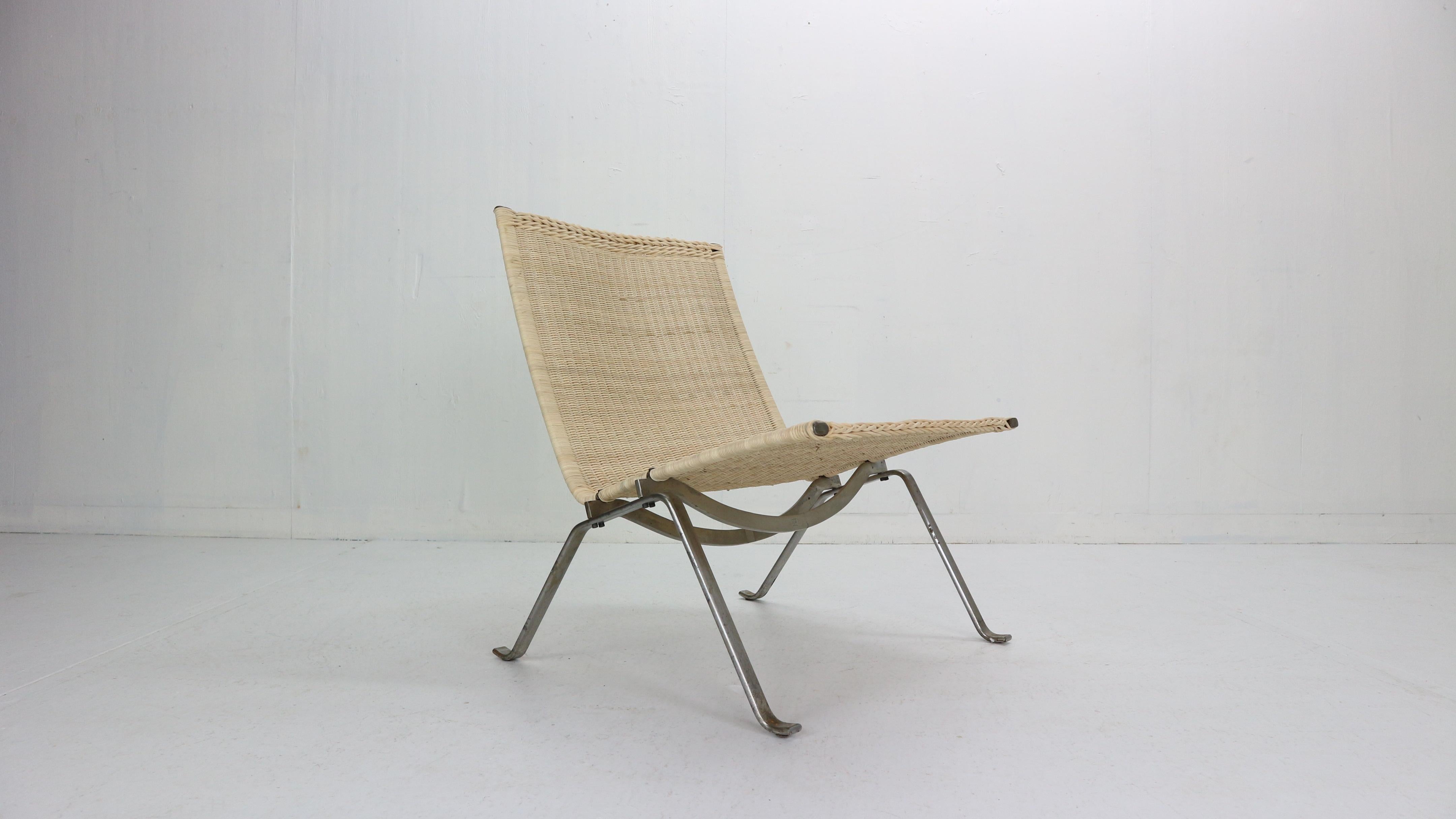 Original first edition PK22 easy chair designed by Poul Kjaerholm for E. Kold Christensen, Denmark, 1956.
Marked in the frame underneath the seat with the EKC logo.

The PK22 chair followed the PK25 lounge chair — completed by Kjærholm while he