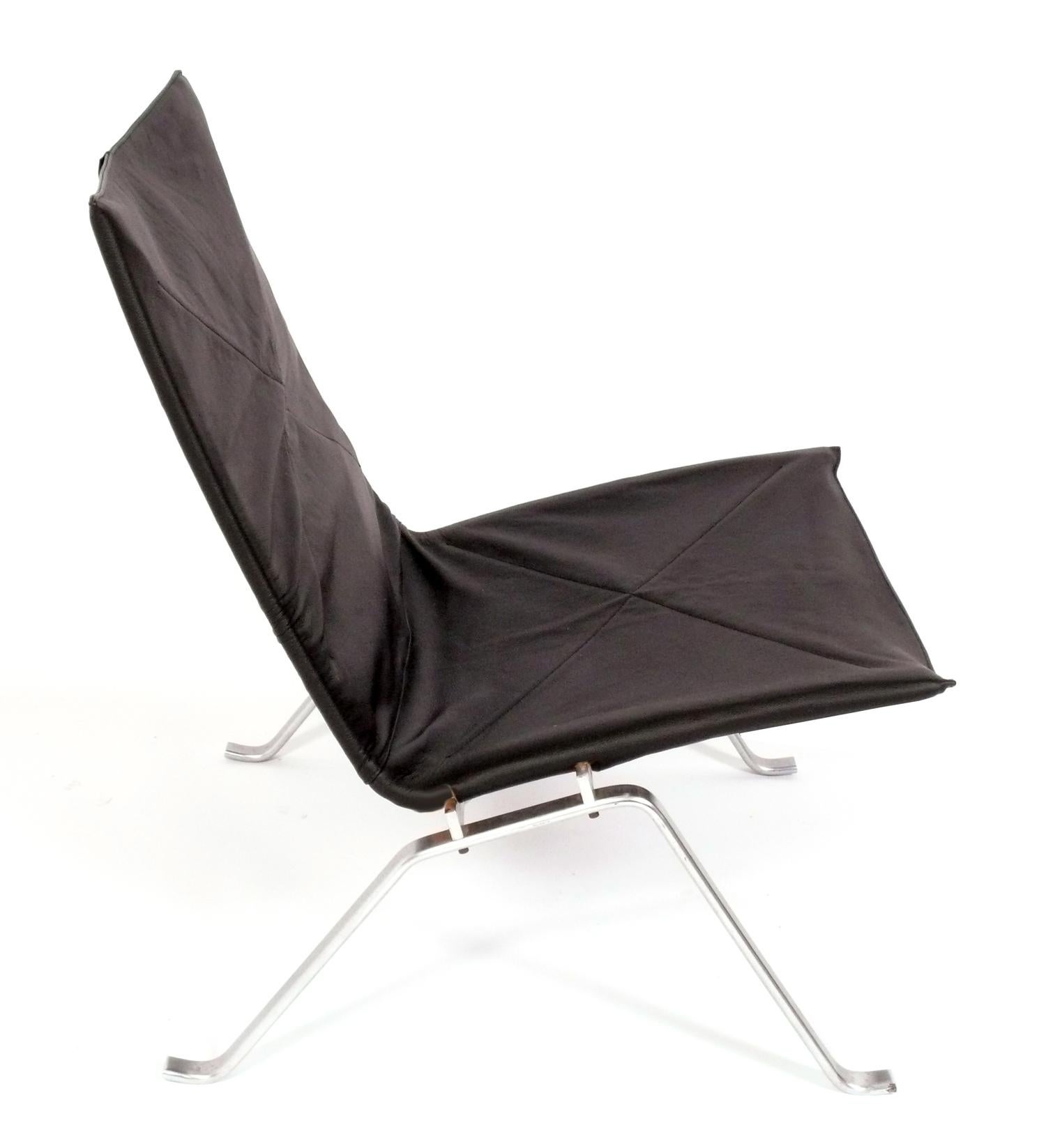 Sculptural PK22 Model Lounge Chair, designed by Poul Kjaerholm for E Kold Christensen, signed, Denmark, circa 1960s. According to the estate where we purchased this chair, the leather cover was replaced in the early 2000s. It does not fit perfectly