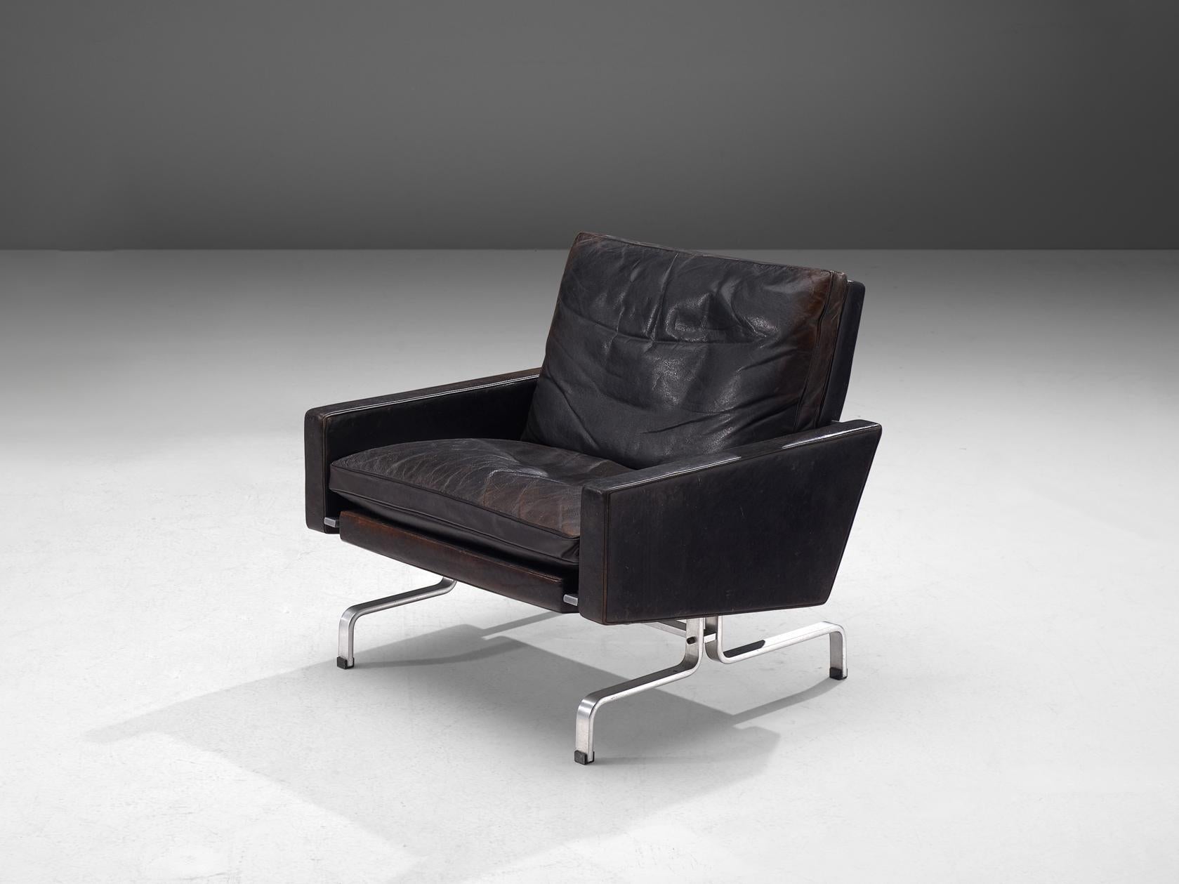 Poul Kjærholm for E. Kold Christensen, 'PK 31-1' lounge chair, leather, chrome-plated steel, Denmark, 1958.

The design features Poul Kjaerholm’s ability to work with exquisite materials and minimalism. The shapes are modest, yet elegant. The chair