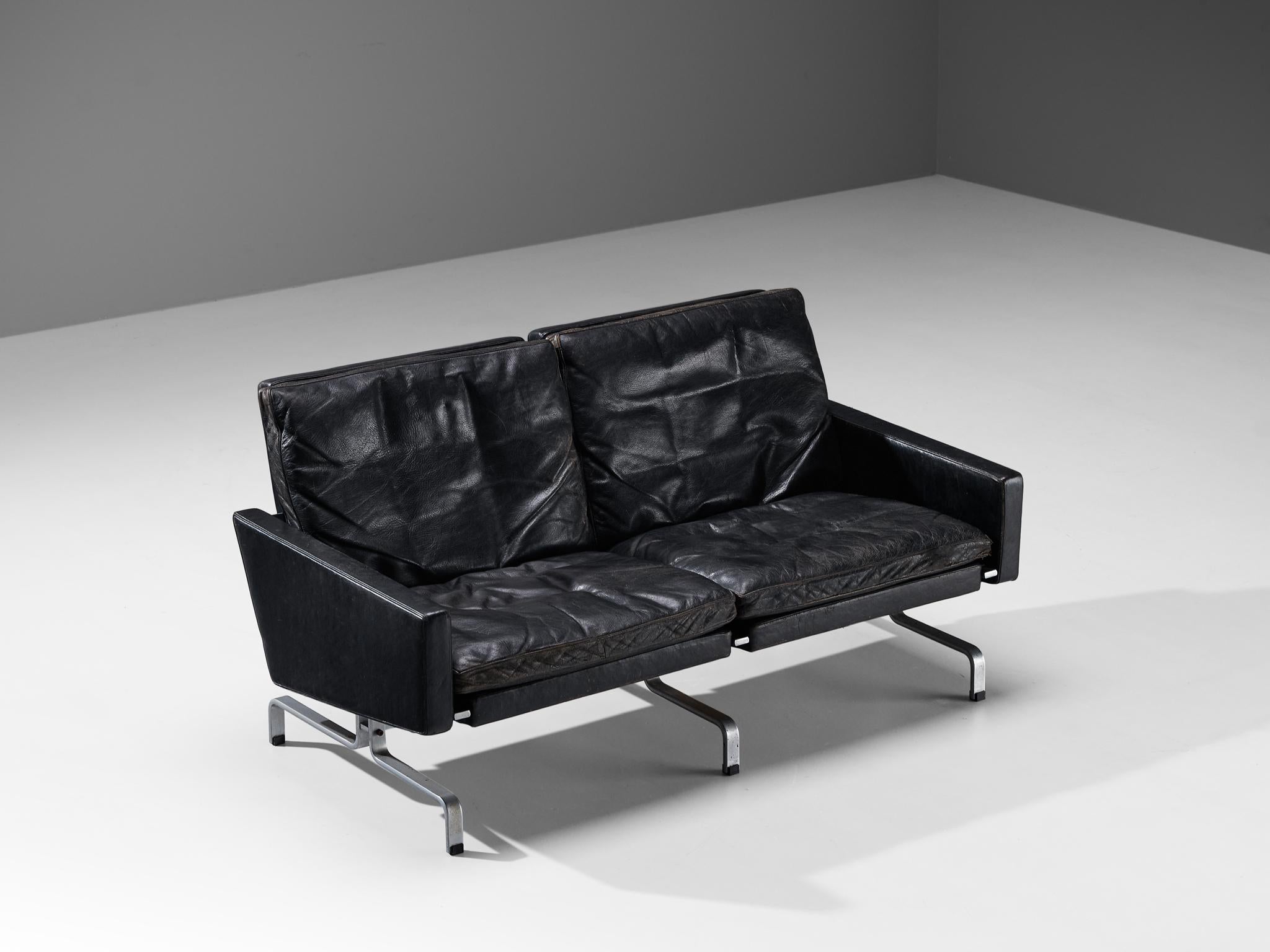 Poul Kjaerholm for E. Kold Christensen, three-seat sofa model PK 31, leather and metal, Denmark, 1958.

Beautiful PK31 sofa in patinated black leather by Poul Kjaerholm for E. Kold Christensen. This sofa features Poul Kjaerholm’s ability to work