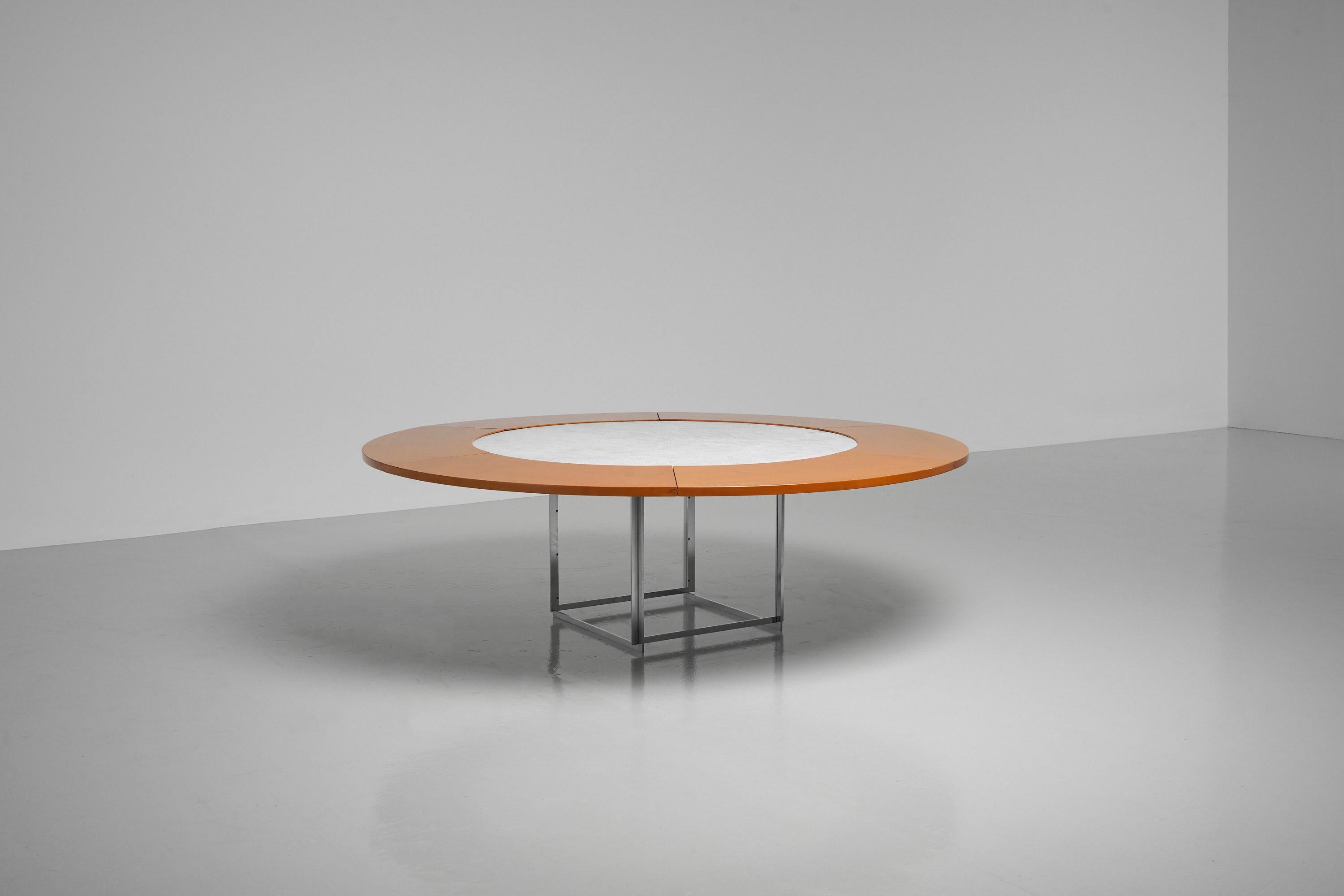 Stunning large sized model PK54 dining table designed by Poul Kjaerholm and manufactured by Fritz Hansen, Denmark 1983. This round dining table is from the second production which was made by Fritz Hansen. Fritz Hansen took over the production and