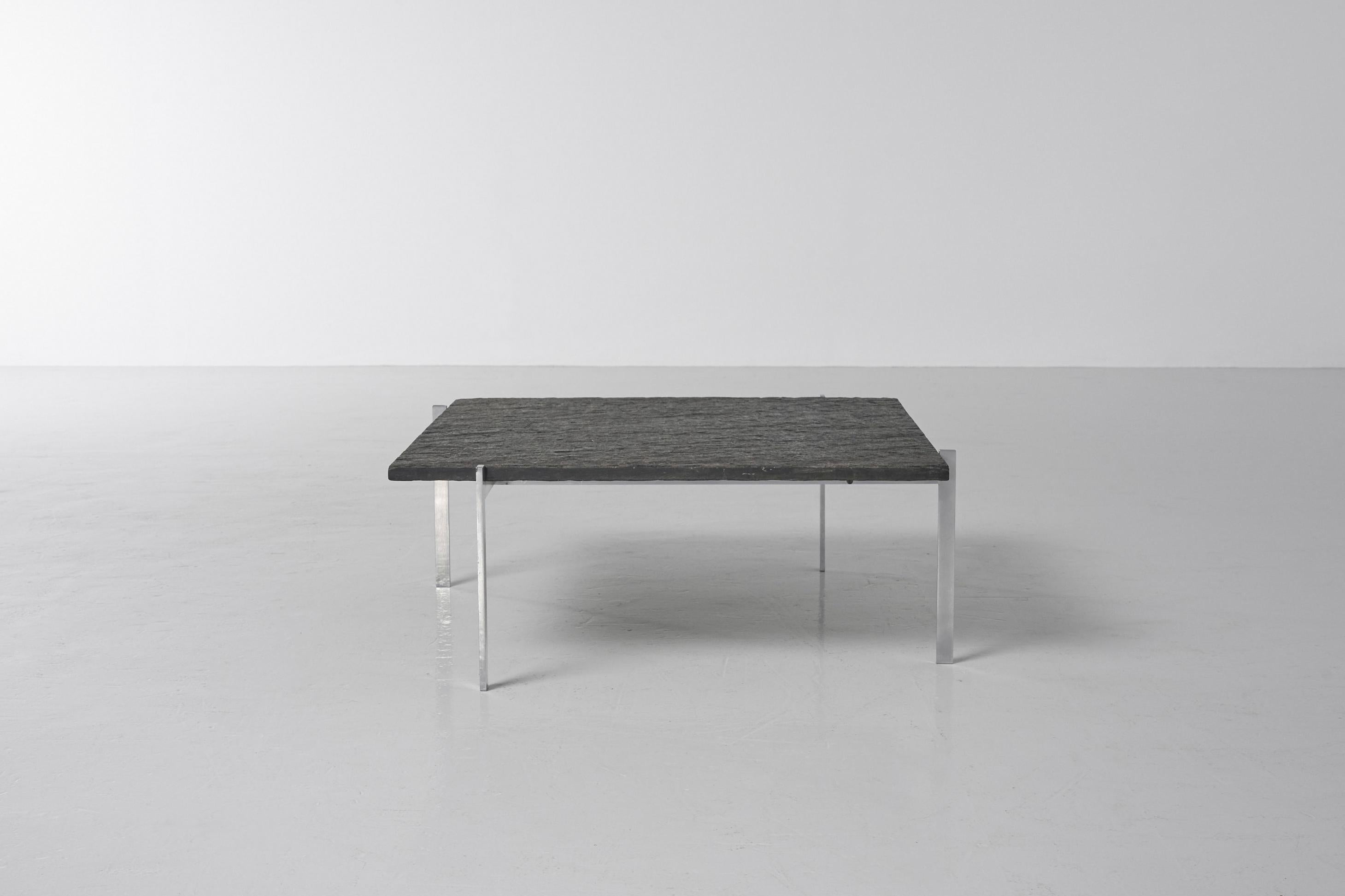An iconic and one of the most well-known designs by furniture architect Poul Kjaerholm, is this model PK61 coffee table which was manufactured by Ejvind Kold Christensen in Denmark, 1956. The minimalistic matt chrome plated steel frame supports the