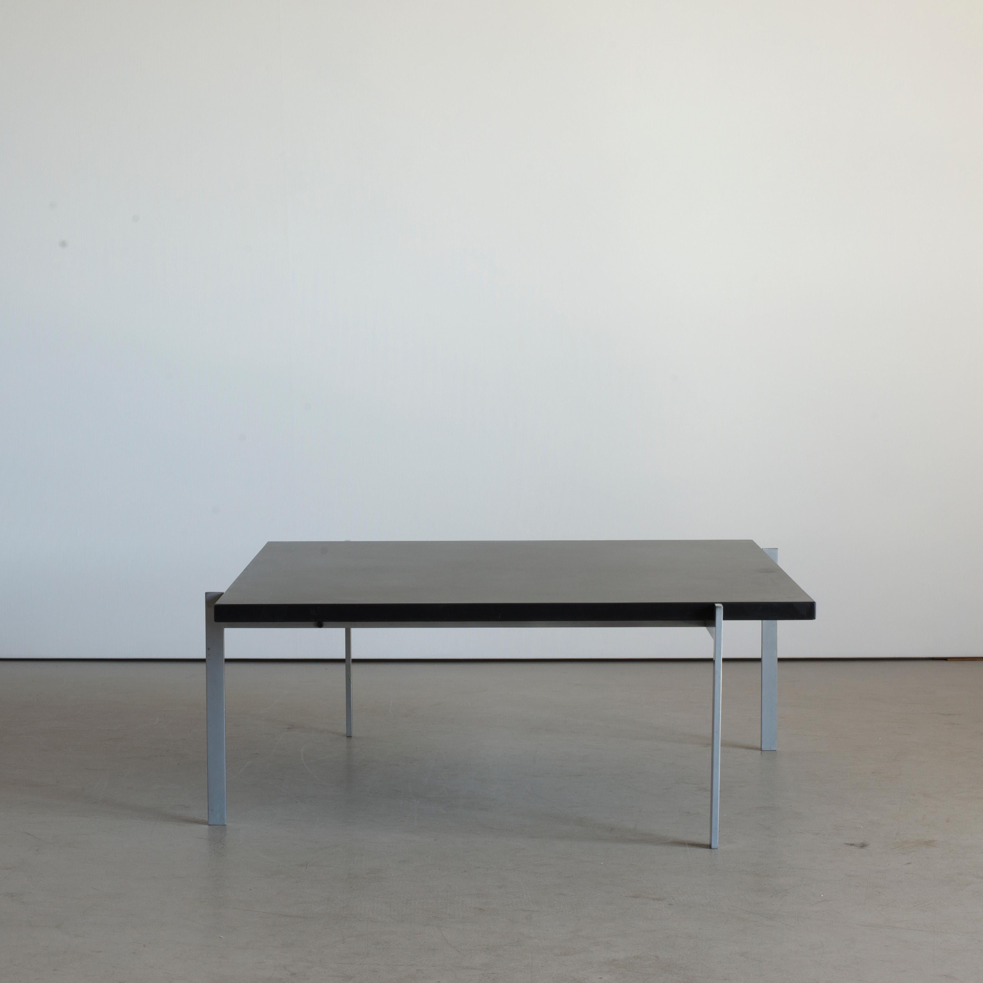 Poul Kjaerholm coffee table PK61. Executed by E. Kold Christensen, Denmark.

Dull chromium plated steel and top of black slate. Marked E. Kold Christensen.