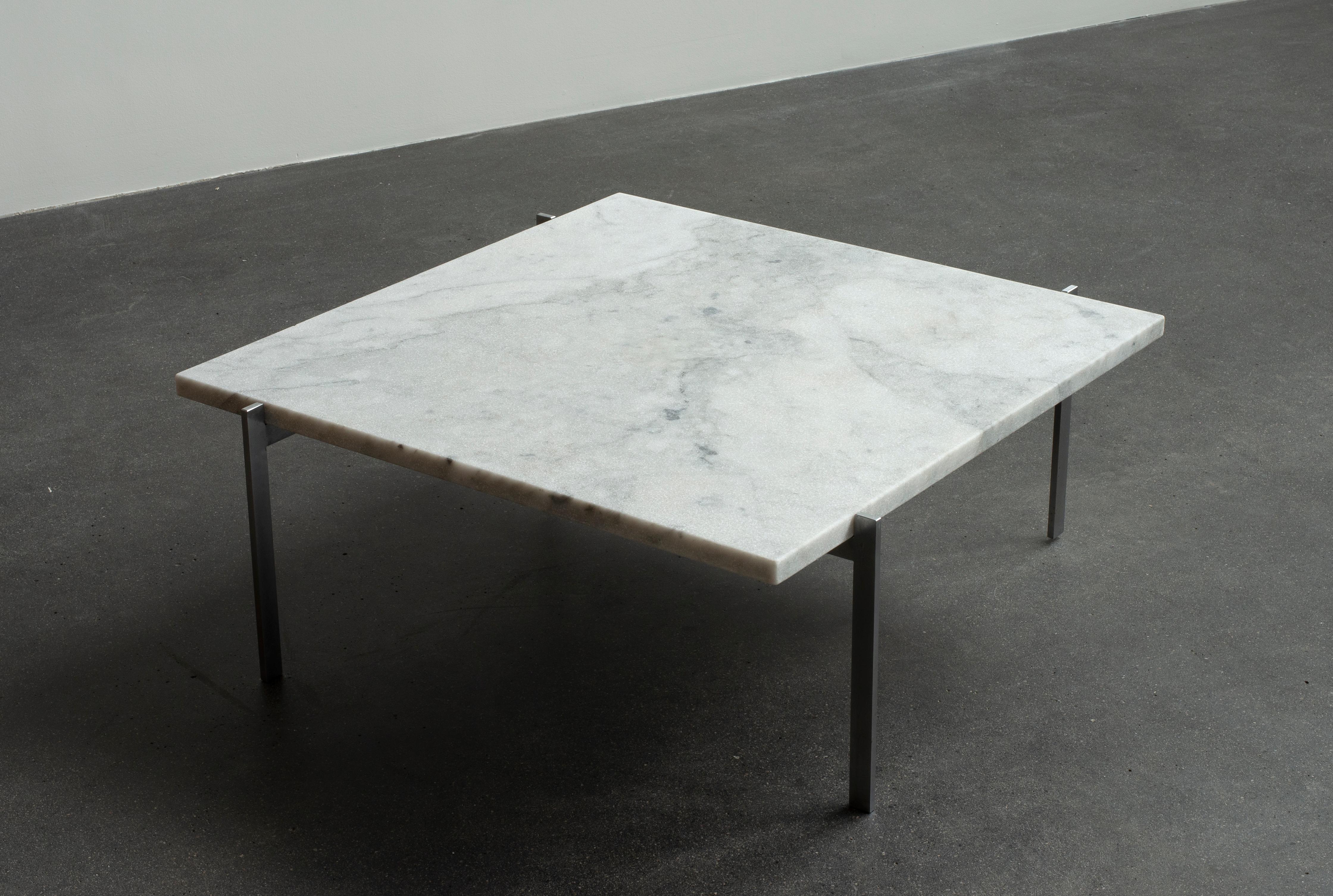 Poul Kjaerholm coffee table PK61. Executed by Fritz Hansen, Denmark.

Dull chromium plated steel and top of flint-rolled marble. Marked Fritz Hansen 1984.