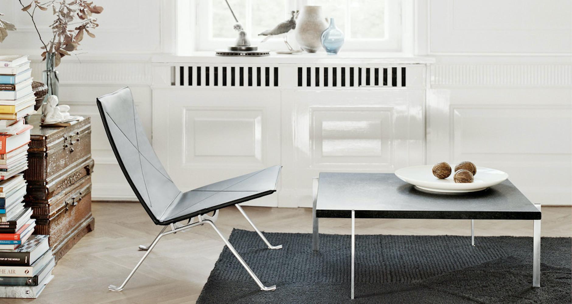 Poul Kjærholm PK61 dark granite coffee table, Fritz Hansen, Denmark. Designed 1956. Manufactured 2008. 

The PK61™ coffee table is as minimalistic as it gets from the hand of Poul Kjærholm. The square, aesthetic design serves as a powerful