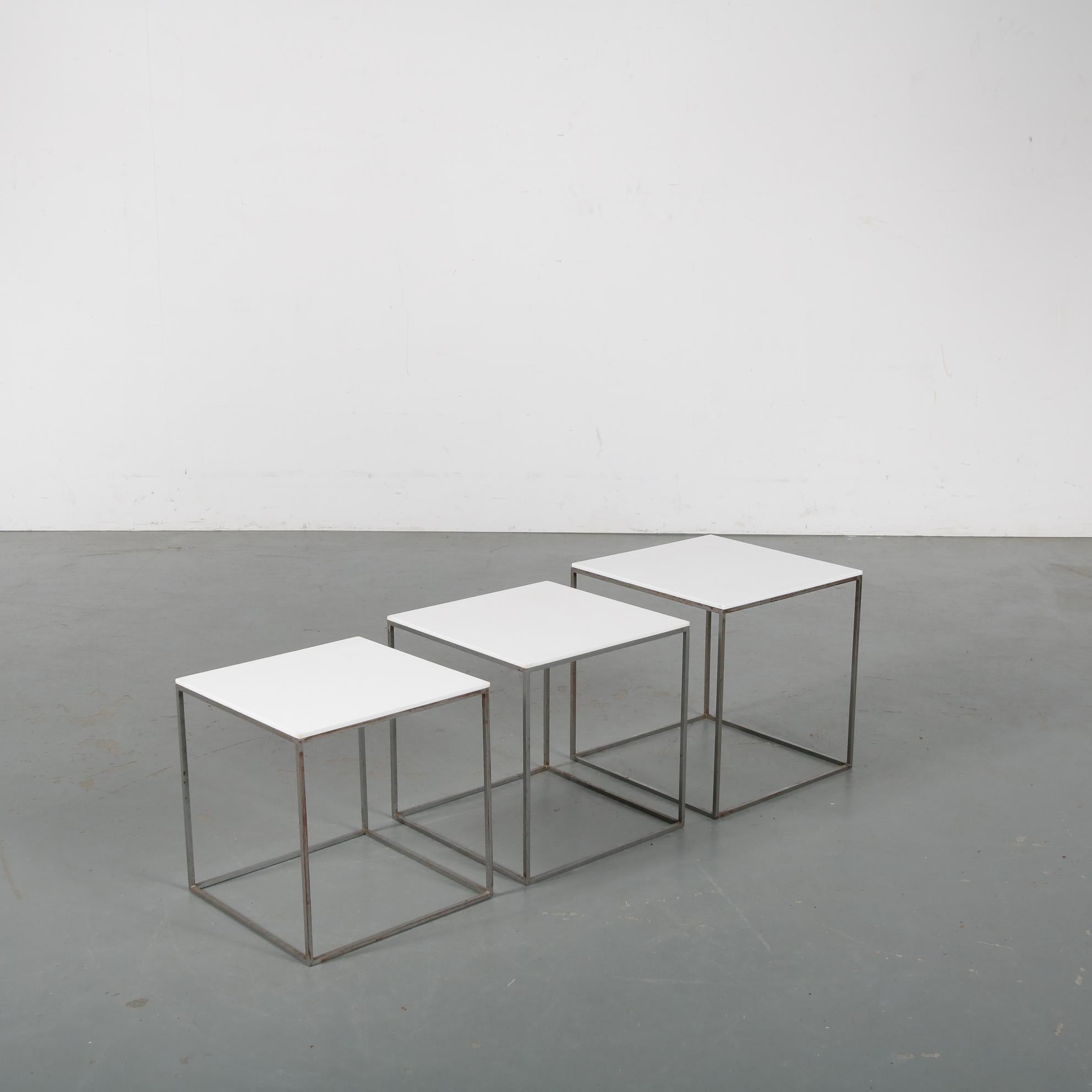 A set of three nesting tables, model PK71, designed by Poul Kjaerholm and manufactured by E. Kold Christensen in Denmark circa 1960.

Each table has an eye-catching square structure made of high quality grey metal. There is some wear and rust