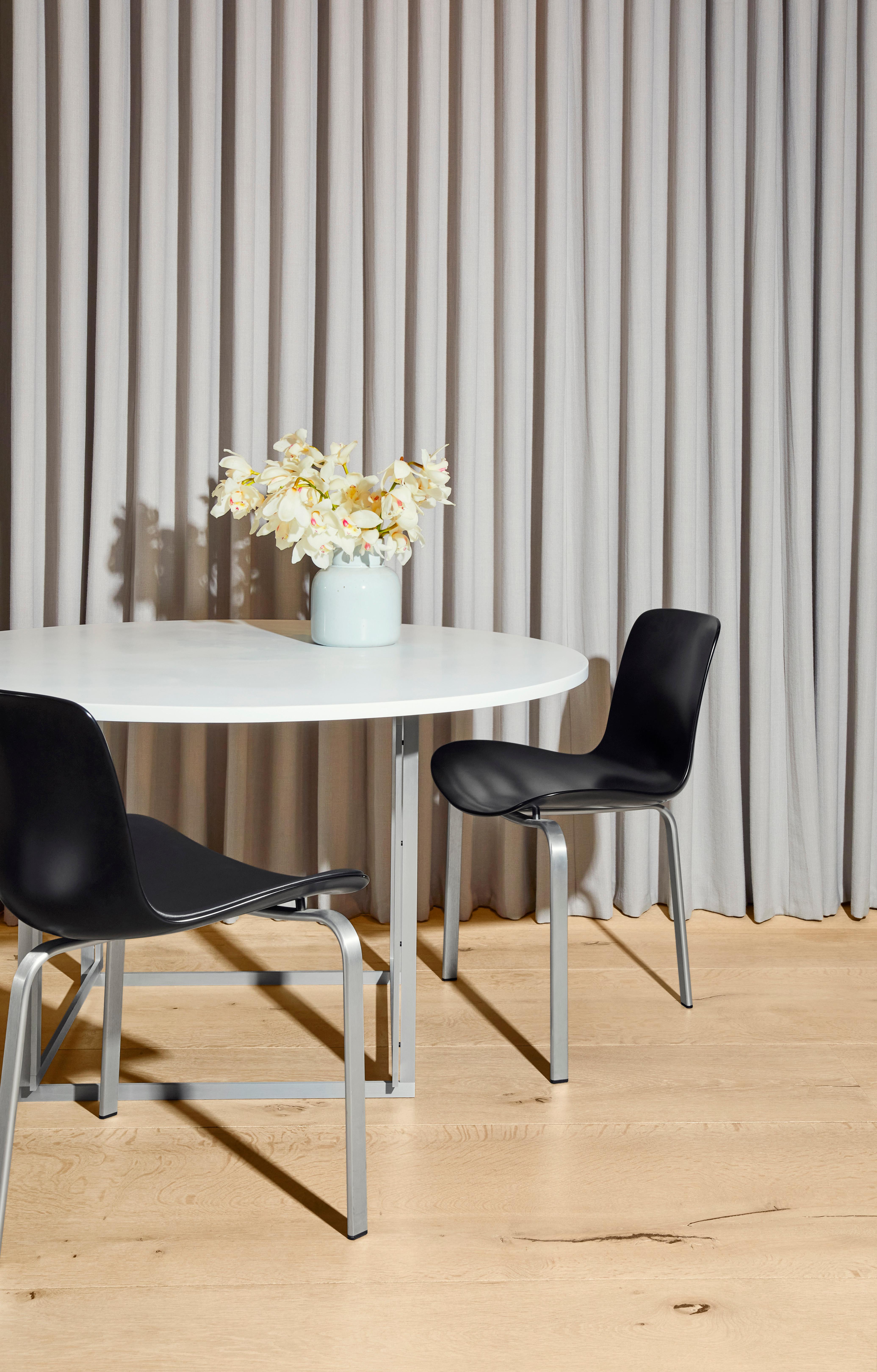 Poul Kjærholm 'PK8' Dining Chair for Fritz Hansen in Aura Leather Upholstery.

Established in 1872, Fritz Hansen has become synonymous with legendary Danish design. Combining timeless craftsmanship with an emphasis on sustainability, the brand’s