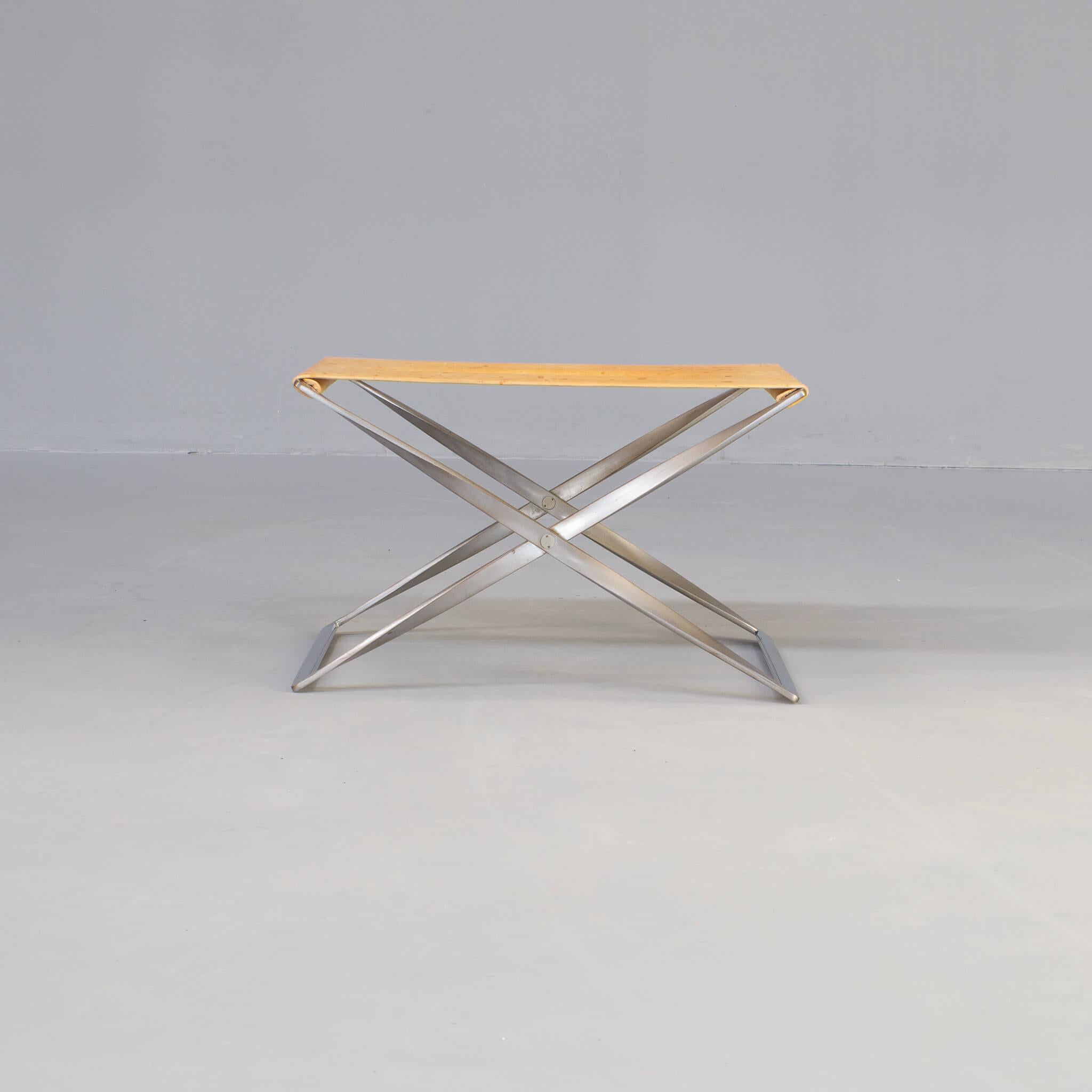 oul Kjaerholm PK91 folding stool for Fritz Hansen.
The PK91 folding stool designed by Poul Kjærholm is based on historical research of Kjaerholm and makes the object completely timeless. The source of inspiration for the folding stool is an ancient