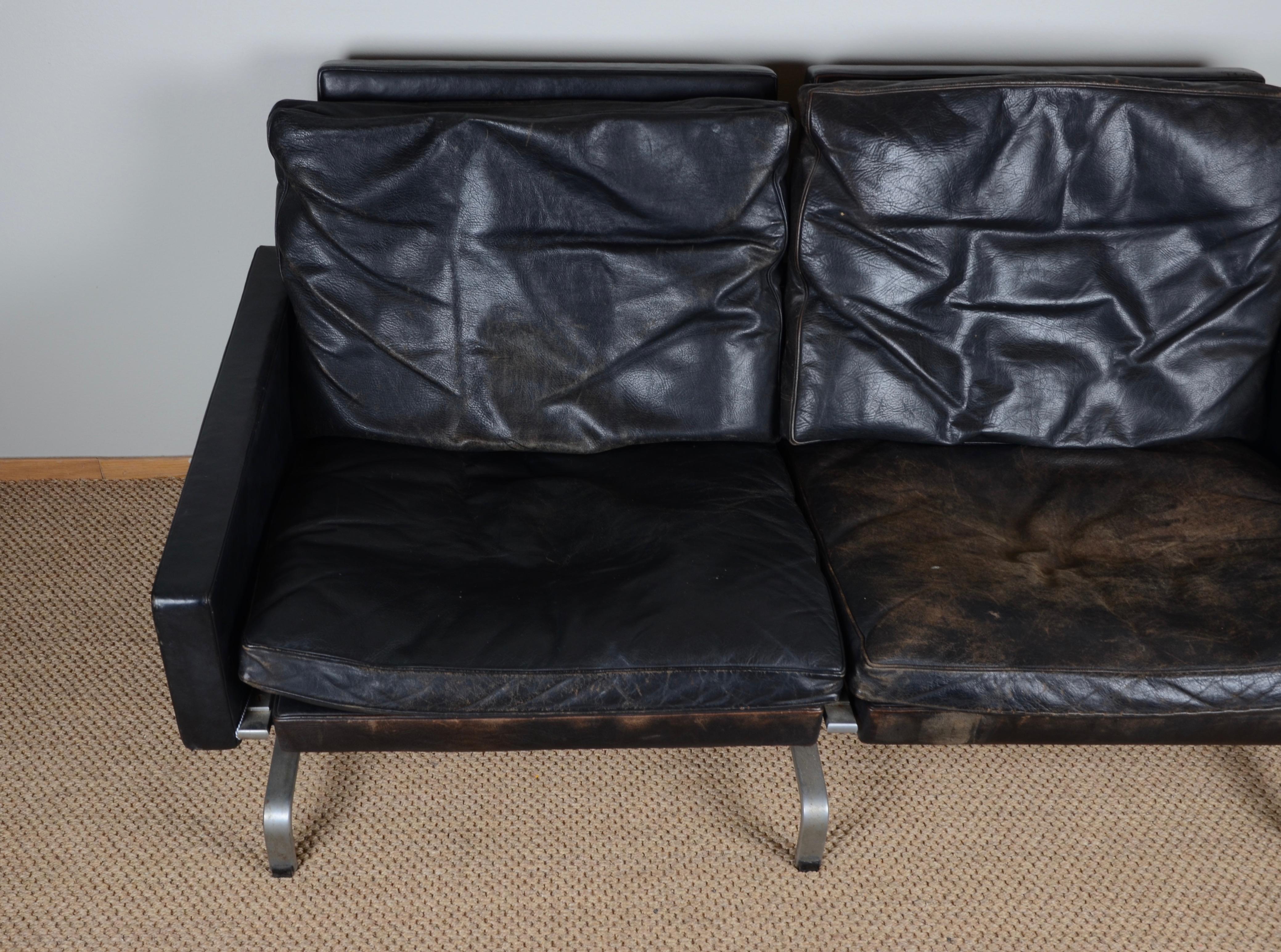 Two-seat sofa, model PK-31, designed by Poul Kjærholm for E. Kold Christensen. Black leather and matt polished steel. Denmark, mid-1900s. 2 pieces available, price per piece.

Maker’s mark in the steel.