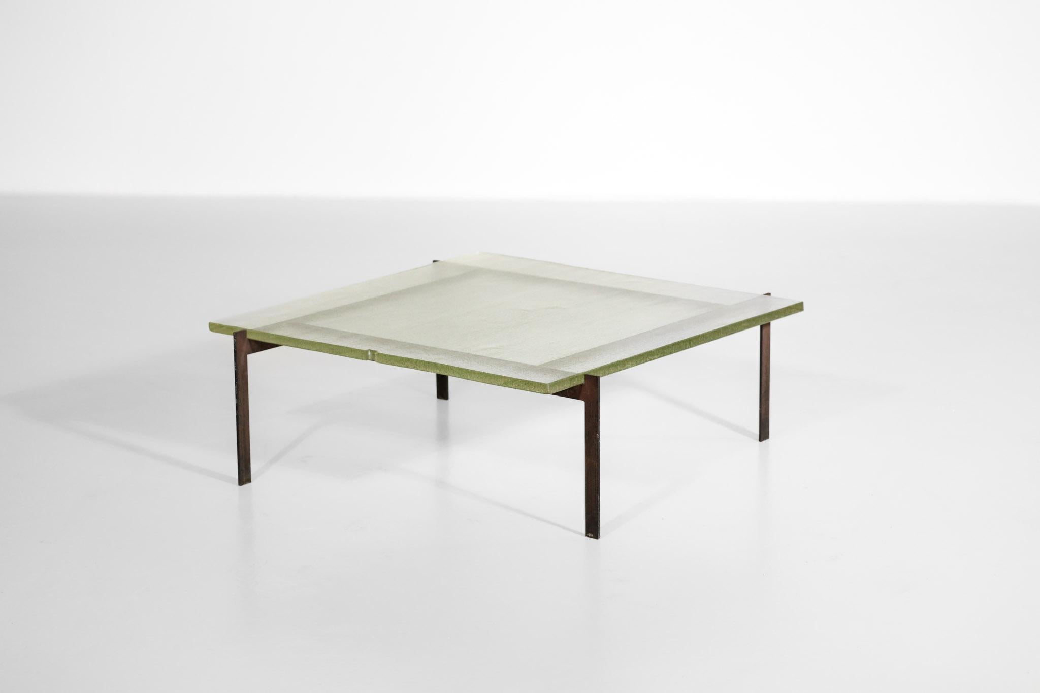 Handcrafted manufacturing coffee table inspired by Poul Kjærholm. Structure in oxidized steel with tempered glass on top. Notch on the glass top (Cf. photos).