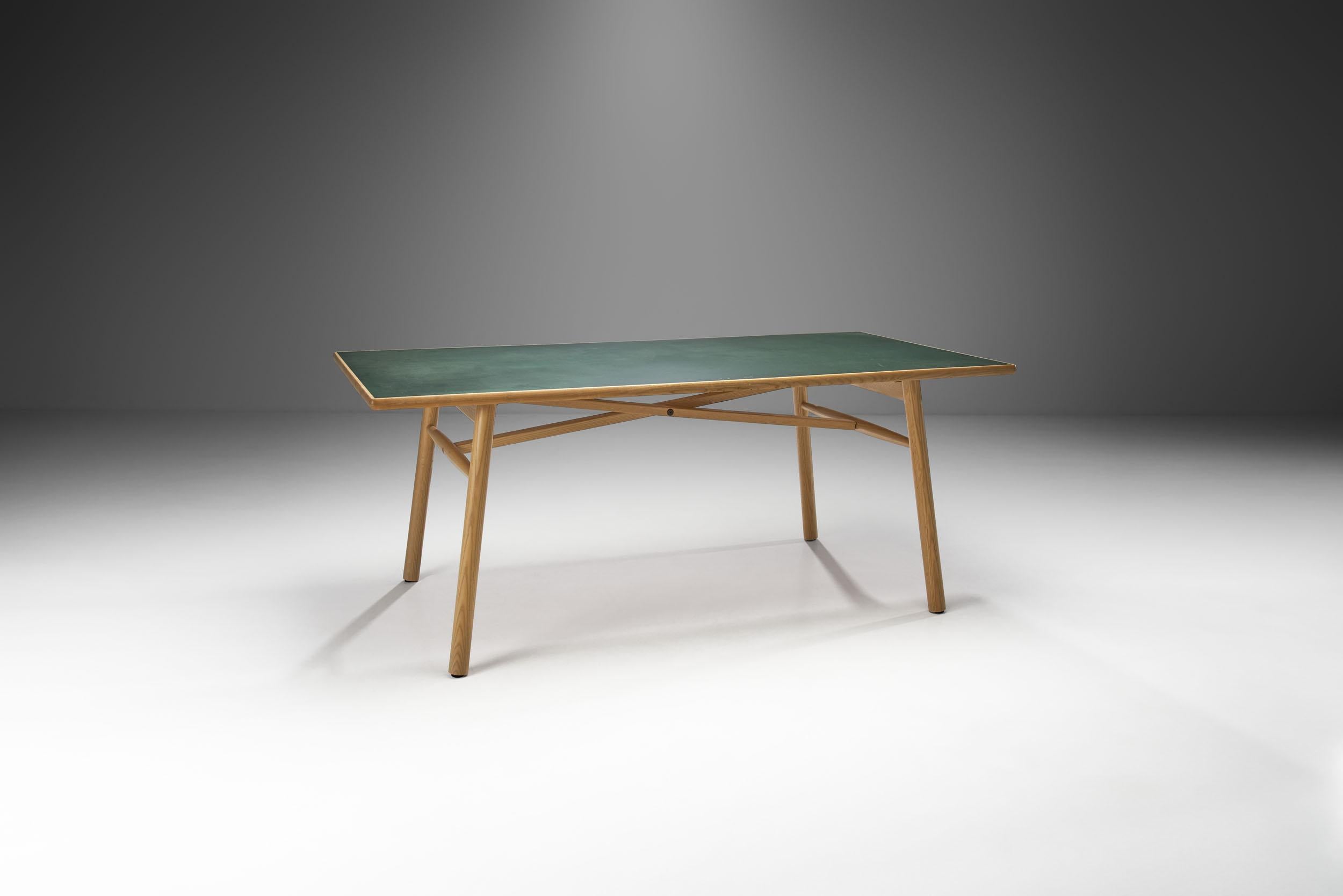 The “C35 FDB” table series was designed by Poul M. Volther in 1957 for Danish Furniture co-operative FDB. The company, FDB Møbler was founded in 1942 with architect, Børge Mogensen heading the studio. According to their philosophy, every new piece