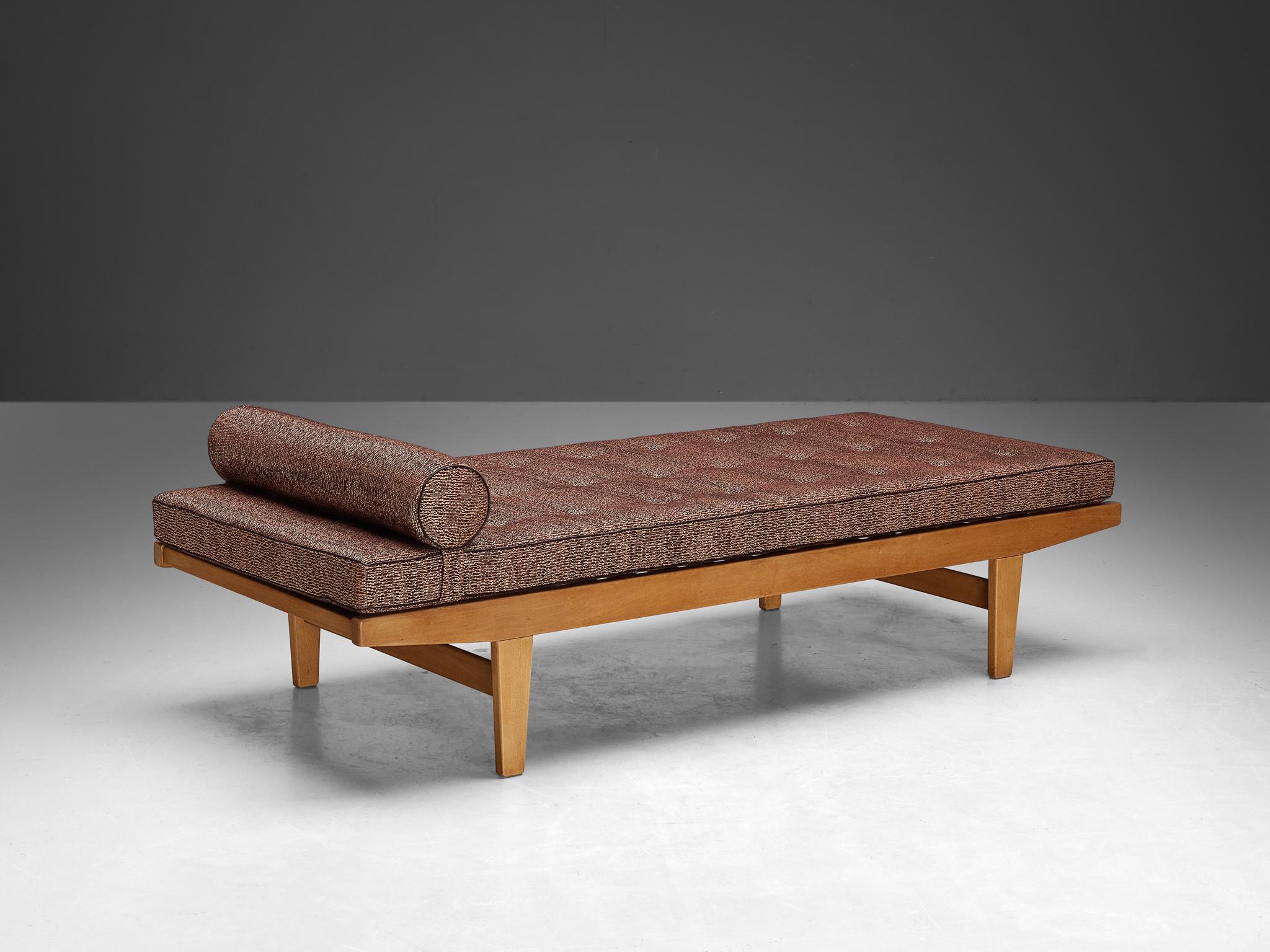 Poul M. Volther for FDB Møbler, daybed, beech, fabric, Denmark, 1960s

A simple and minimalist bed designed by Danish furniture designer Poul M. Volther. The construction is based on clear lines and angular shapes. Its simple and pure exterior will