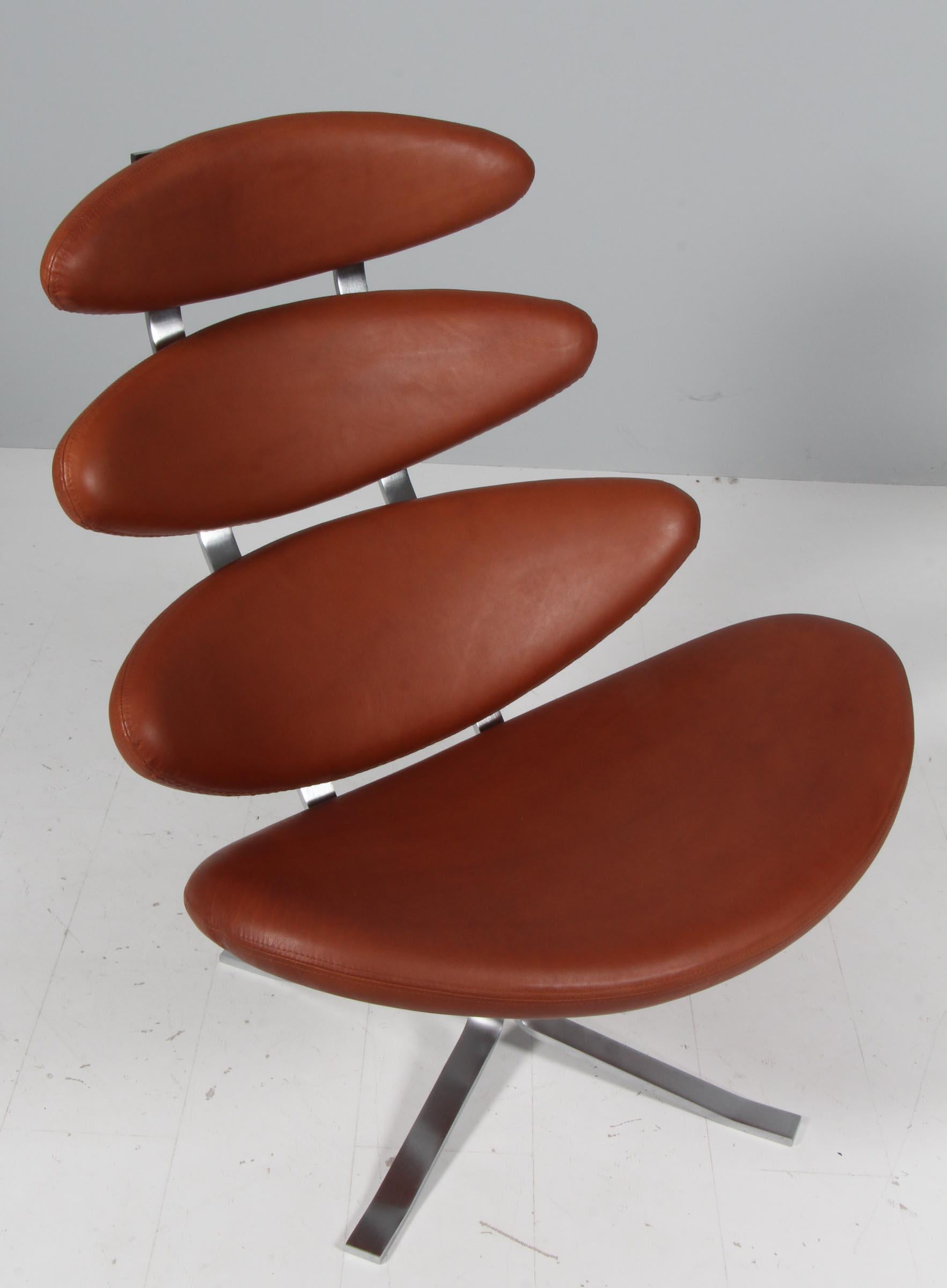 Poul M. Volther lounge chair new upholstered with brandy coloured full grain aniline leather.

Frame of brushed steel.

Model EJ-5 Corona, made by Erik Jørgensen.