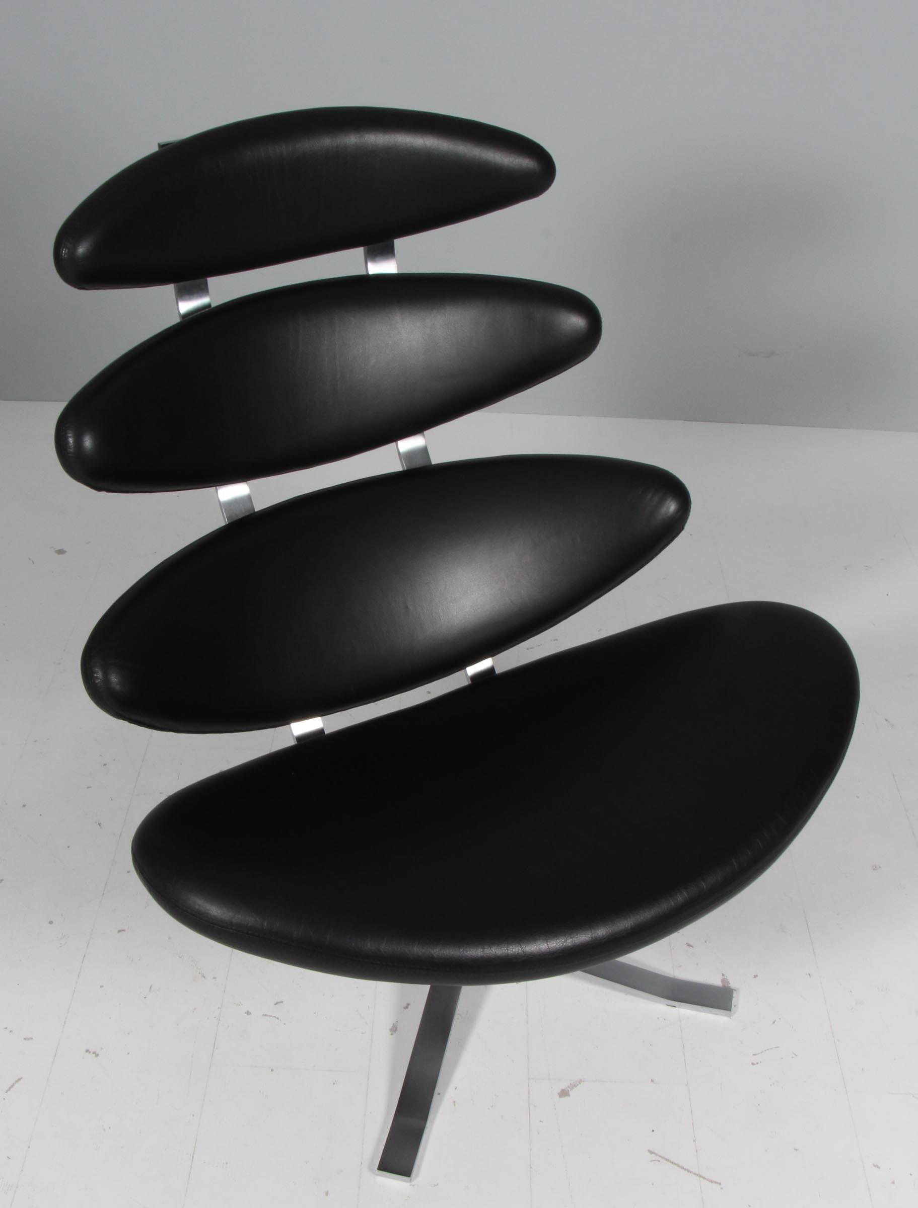 Poul M. Volther lounge chair in original black leather.

Frame of brushed steel.

Model EJ-5 Corona, made by Erik Jørgensen.