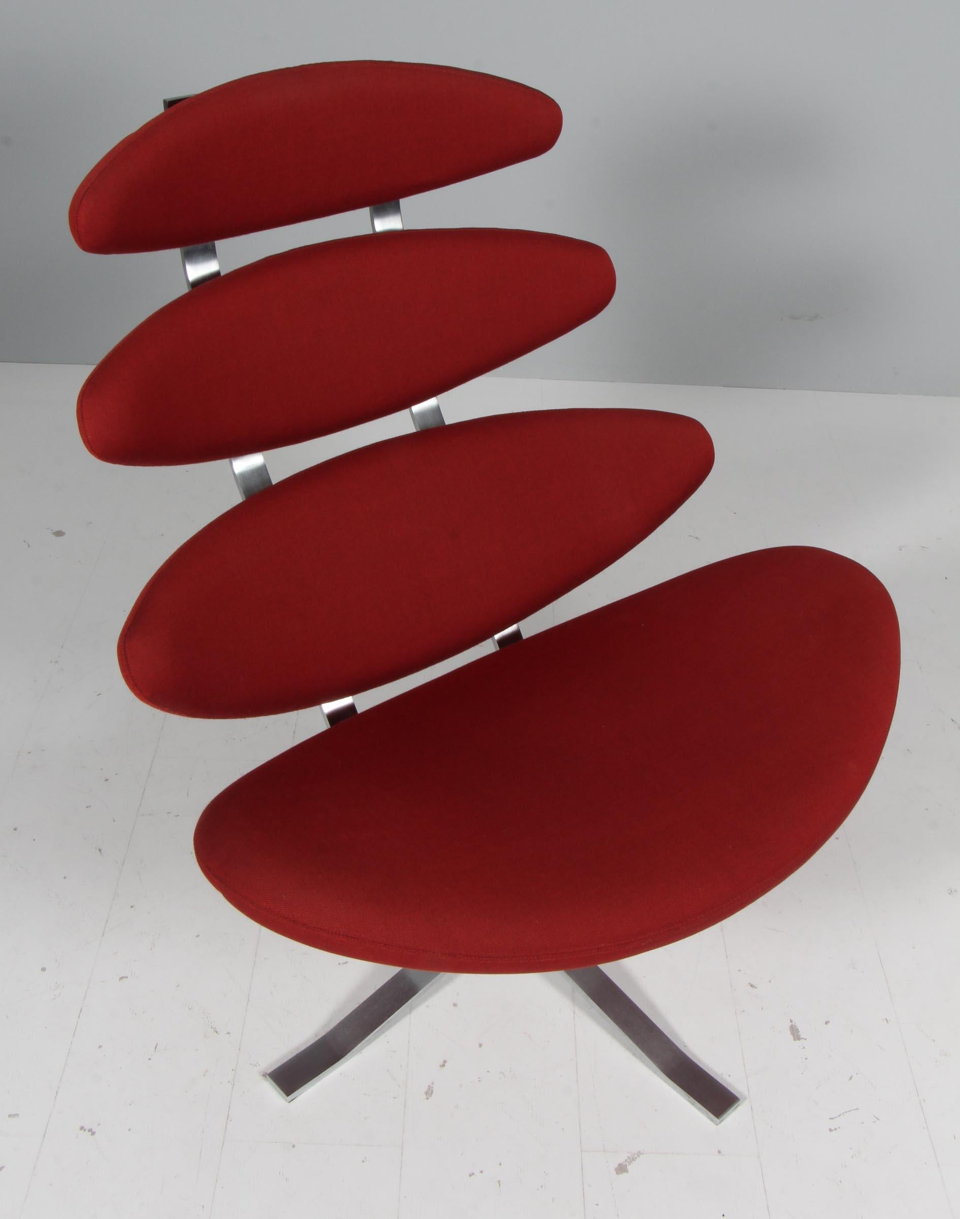 Poul M. Volther lounge chair in original red fabric.

Frame of brushed steel.

Model EJ-5 Corona, made by Erik Jørgensen.