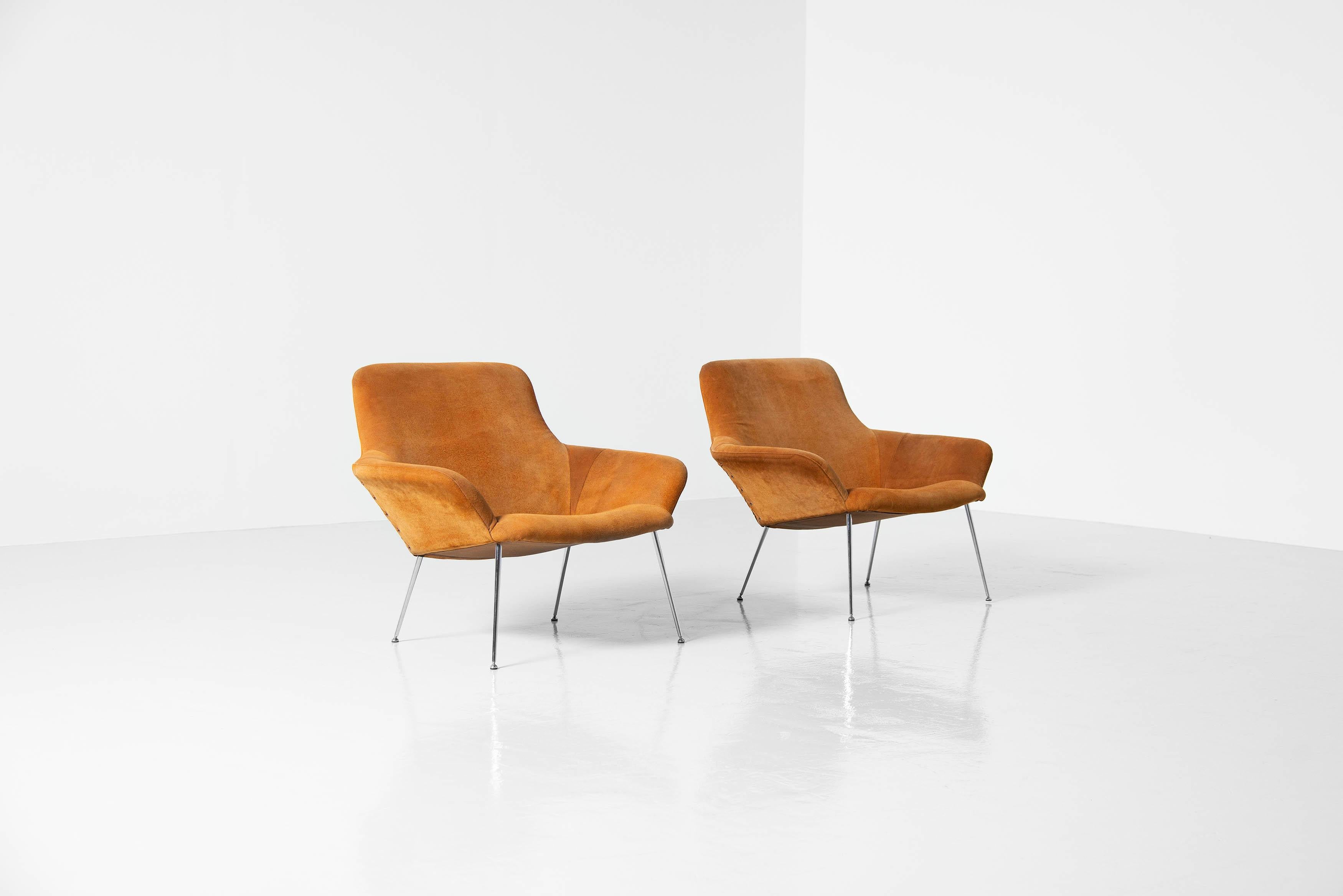 Stunning pair of 620/1 lounge chairs designed by Poul Norreklit, Denmark 1959. These beautiful kind of mantis shaped lounge chairs have a metal structure, covered with beautiful cognac suede which has a stunning patina which brings lots of character