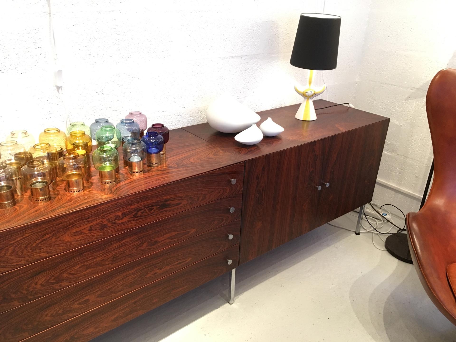 Poul Norreklit rosewood sideboard produced by Sigurd Hansen Denmark, circa 1960
Three sideboards of one meter long each.
Four drawers on the middle one.