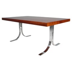 Poul Nørreklit dining table with extension leaf. Rosweood and Chromed steel